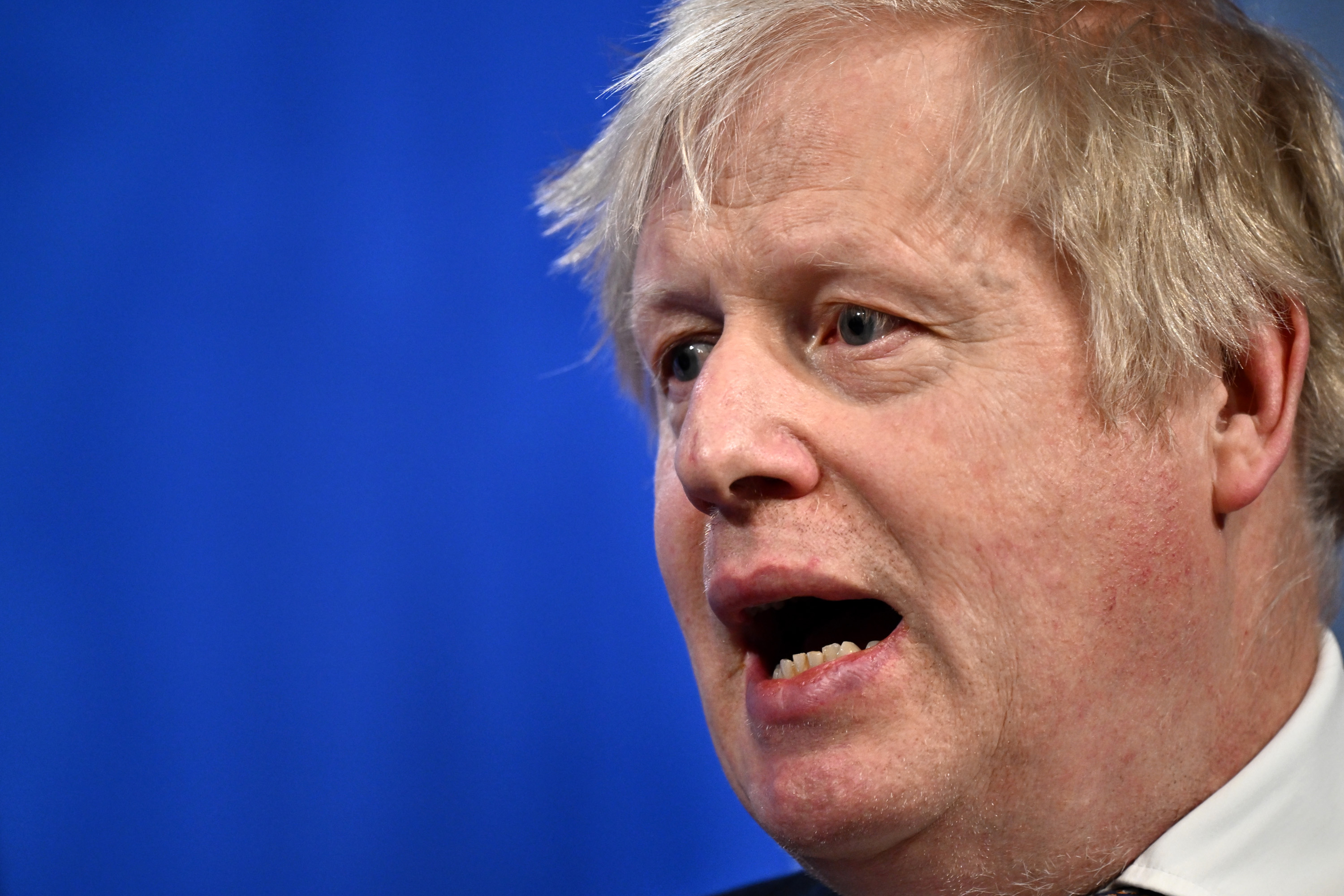 Britain’s Prime Minister, Boris Johnson, speaks during a joint press conference with German Chancellor Olaf Scholz (not pictured) inside the Downing Street briefing room on April 8, 2022, in London.