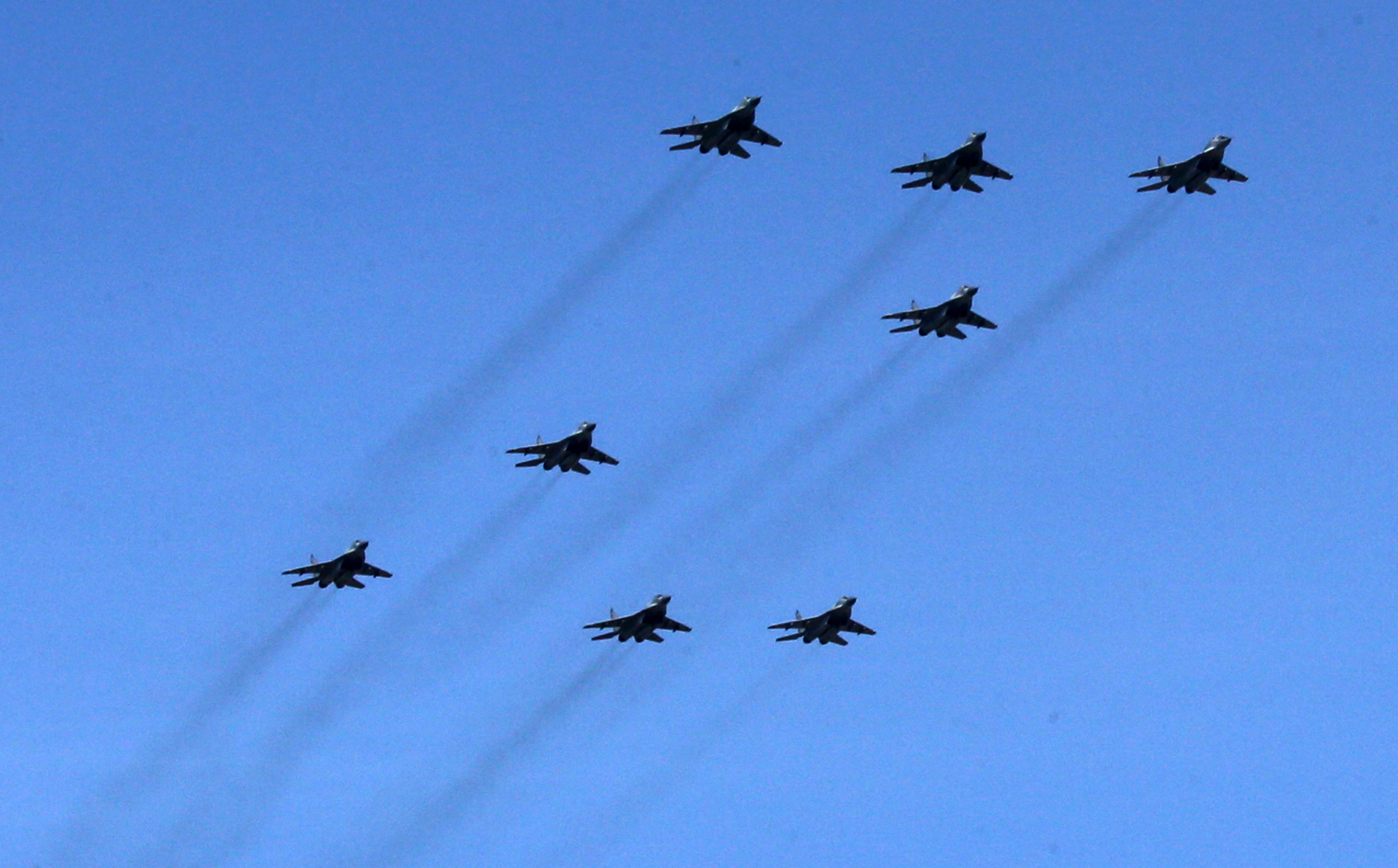 Mikoyan MIG-29 (NATO reporting name: Fulcrum) jet fighters show the letter "Z," a symbol of the Russian military invasion of Ukraine, over the polygon during the parade rehearsals, April 18 in Alabino, outside of Moscow, Russia. About 12,000 soldiers and officers are expected to take pat at the Red Square Victory Day Military Parade, planned on May 9.
