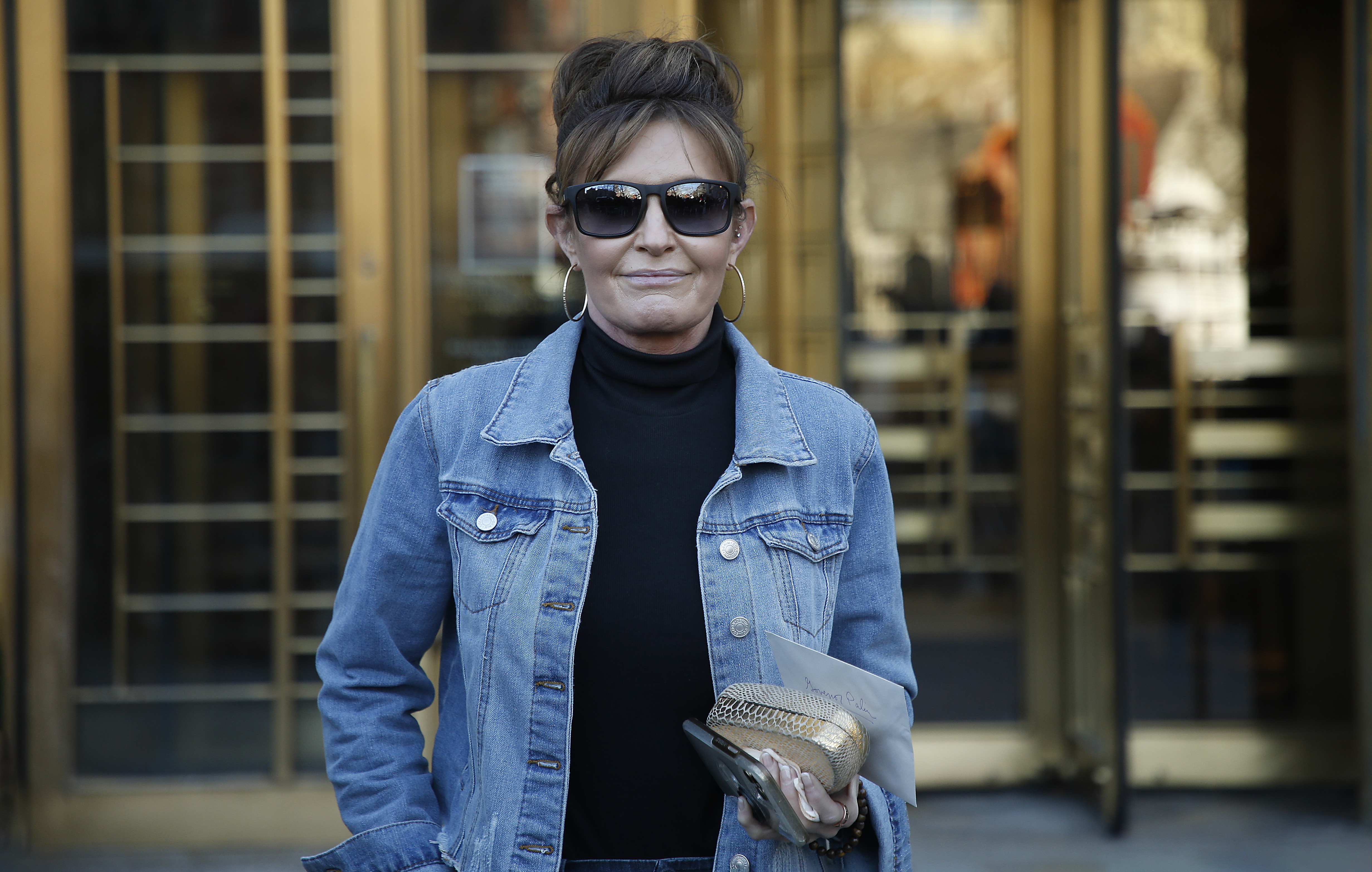 Sarah Palin leaves court after her defamation case against New York Times was dismissed on Feb. 15 in New York City.