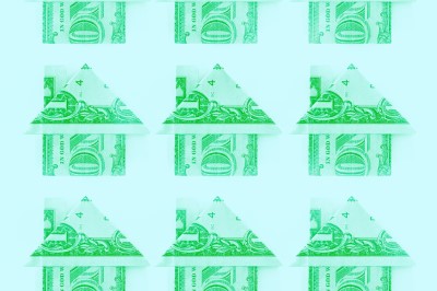 Artistic rendering of houses made of money