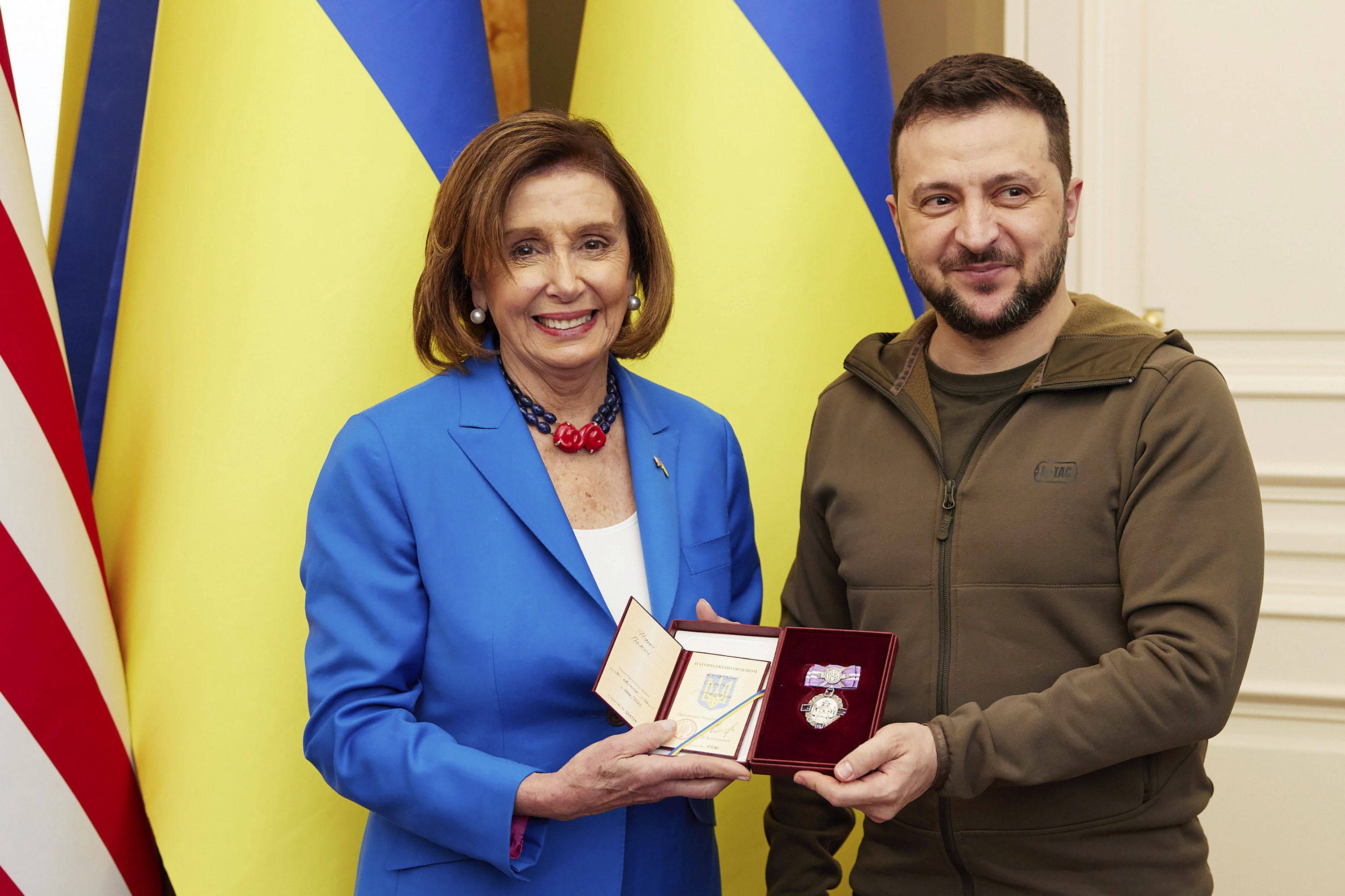 In this image released by the Ukrainian Presidential Press Office on Sunday, May 1, Ukrainian President Volodymyr Zelenskyy, right, awards the Order of Princess Olga, the third grade, to U.S. Speaker of the House Nancy Pelosi in Kyiv, Ukraine, Saturday, April 30. Pelosi, second in line to the presidency after the vice president, is the highest-ranking American leader to visit Ukraine since the start of the war, and her visit marks a major show of continuing support for the country's struggle against Russia.