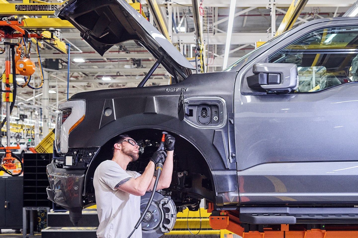 Ford and GM are going all in on electric cars, and thousands of jobs hang in the balance