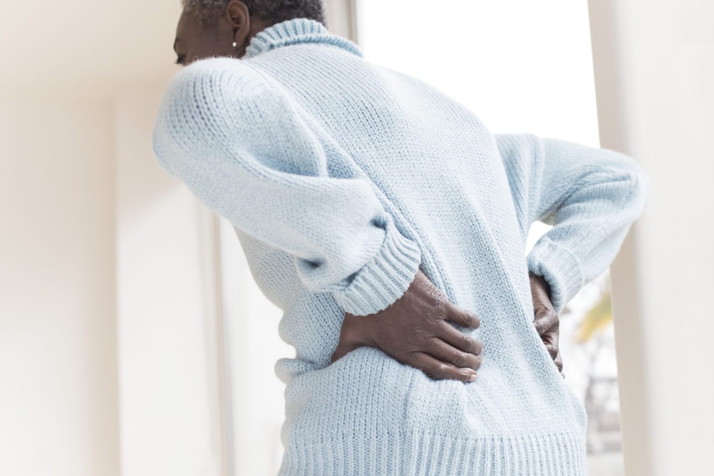 woman with back pain