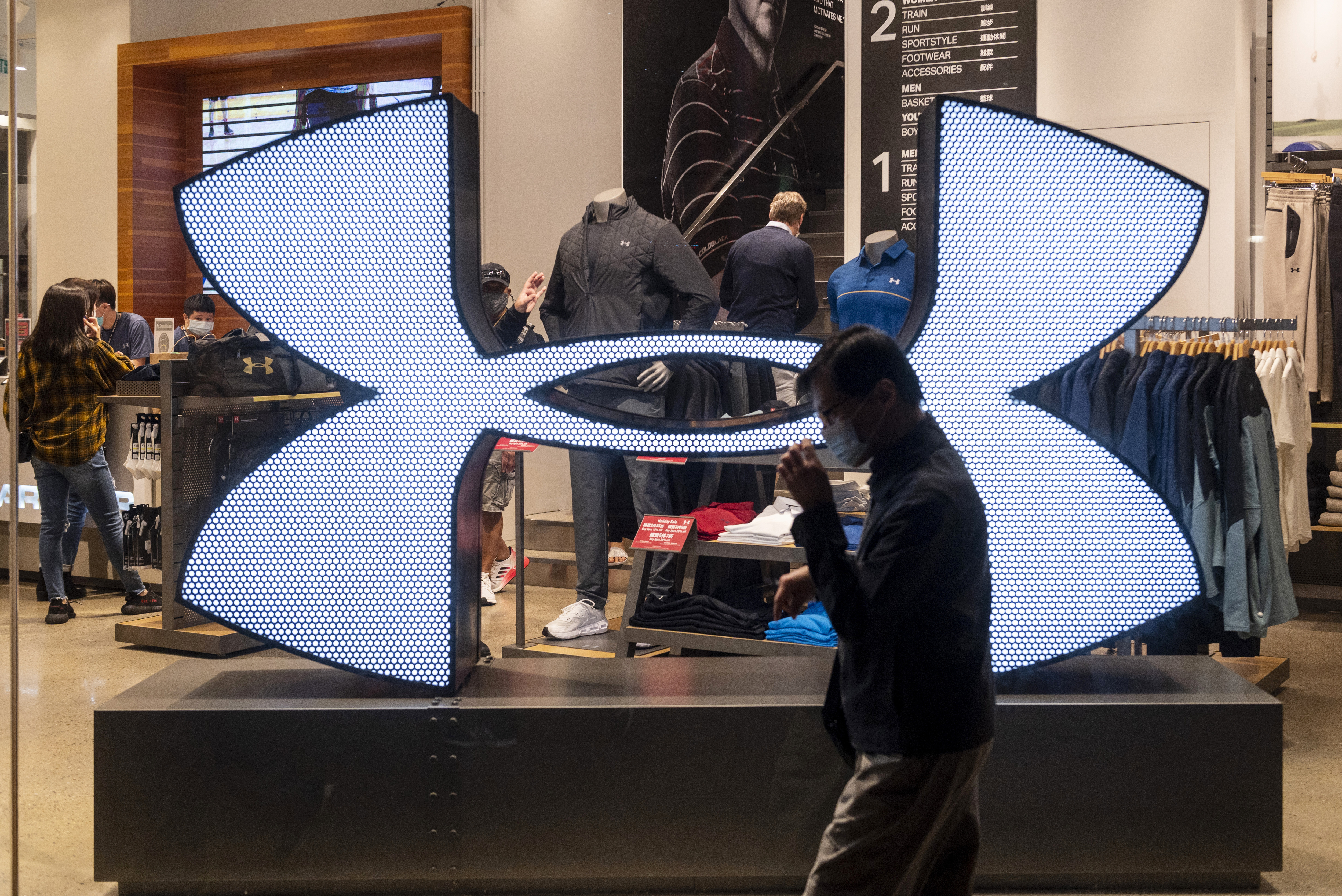 Athletic wear companies Under Armour and Adidas received a drubbing from investors after COVID lockdowns in China clouded their outlook for this year.
