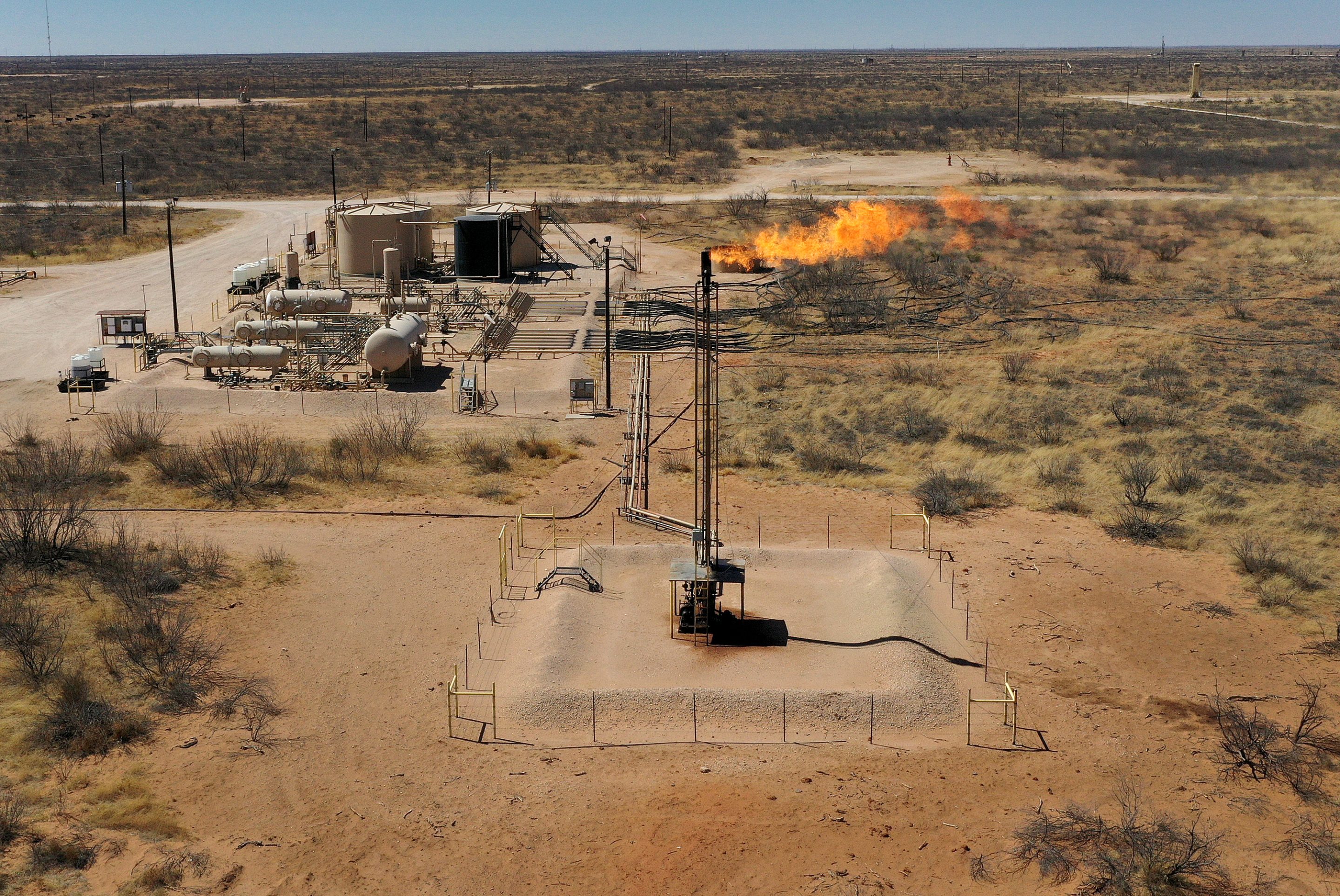 Natural gas is flared off in a Permian Basin oil field in Andrews, Texas.