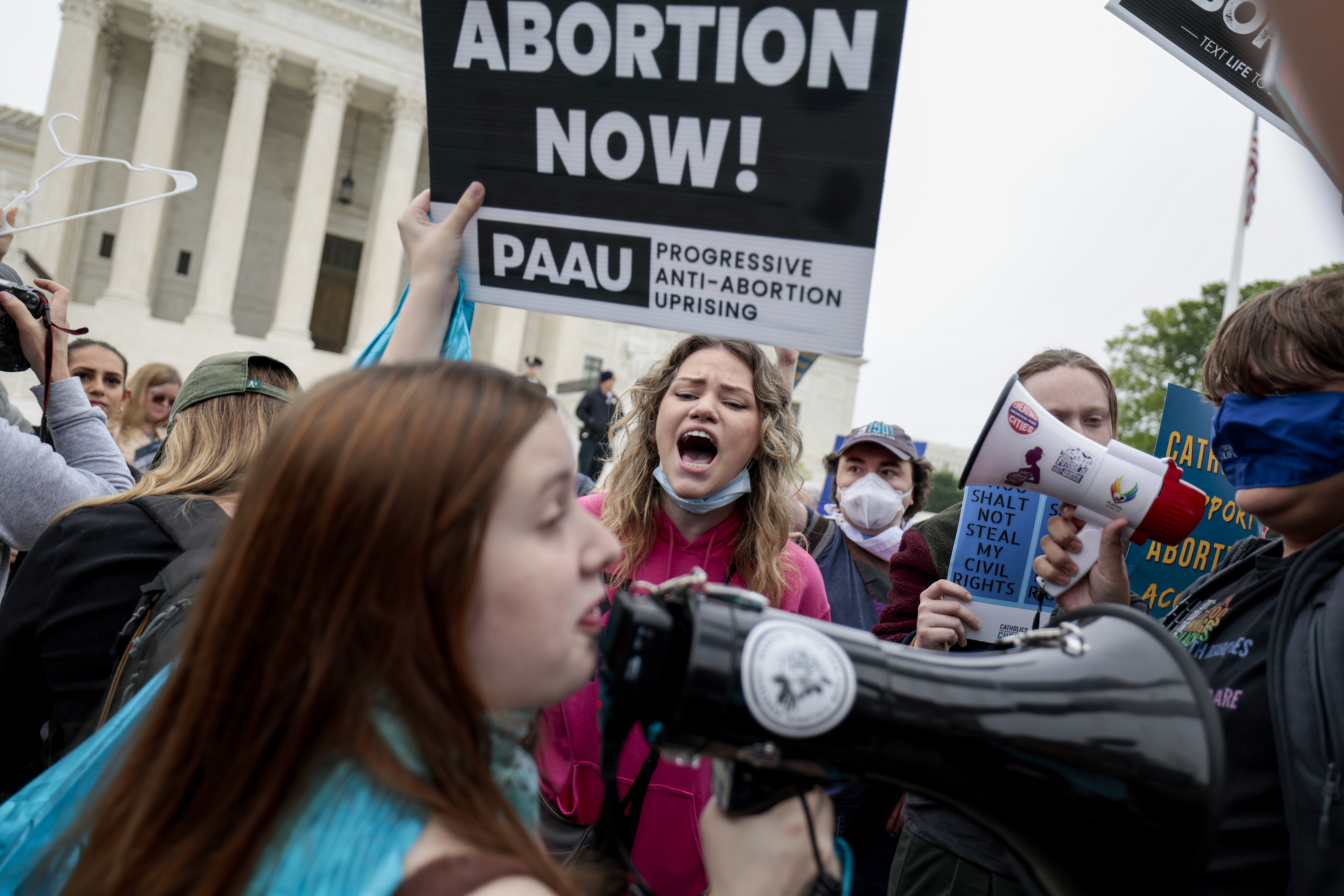 Washington, DC - MAY 03: Pro-choice and anti-abortion activists demonstrate in front of the U.S. Supreme Court Building on May 03, 2022 in Washington, DC. In a leaked initial draft majority opinion obtained by Politico, Supreme Court Justice Samuel Alito allegedly wrote that the cases Roe v. Wade and Planned Parenthood of Southeastern Pennsylvania v. Casey should be overturned, which would end federal protection of abortion rights across the country.