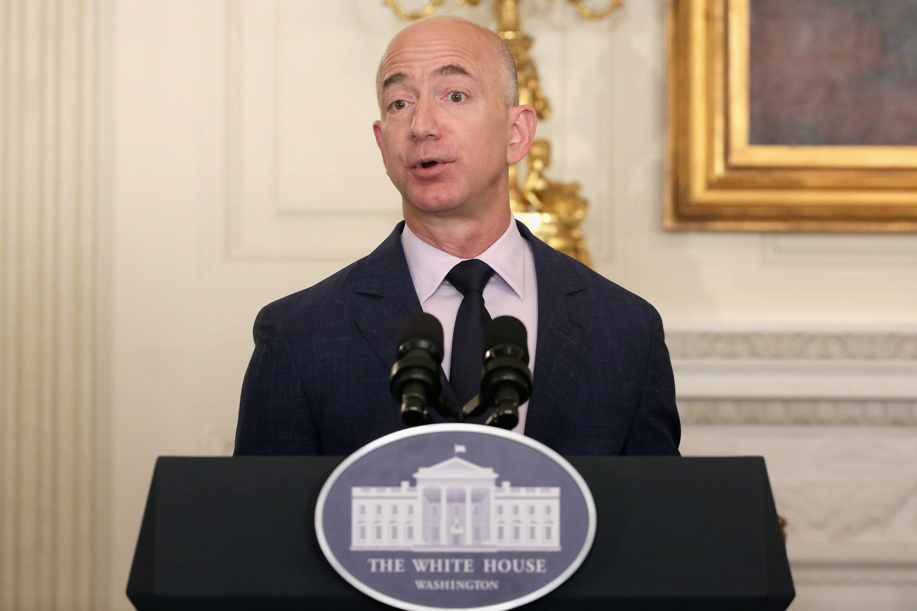 Amazon founder and CEO Jeff Bezos delivers remarks during an event announcing commitments from more than 50 companies that have pledged to hire and train veterans and military spouses in the State Dining Room at the White House May 5, 2016, in Washington, D.C.