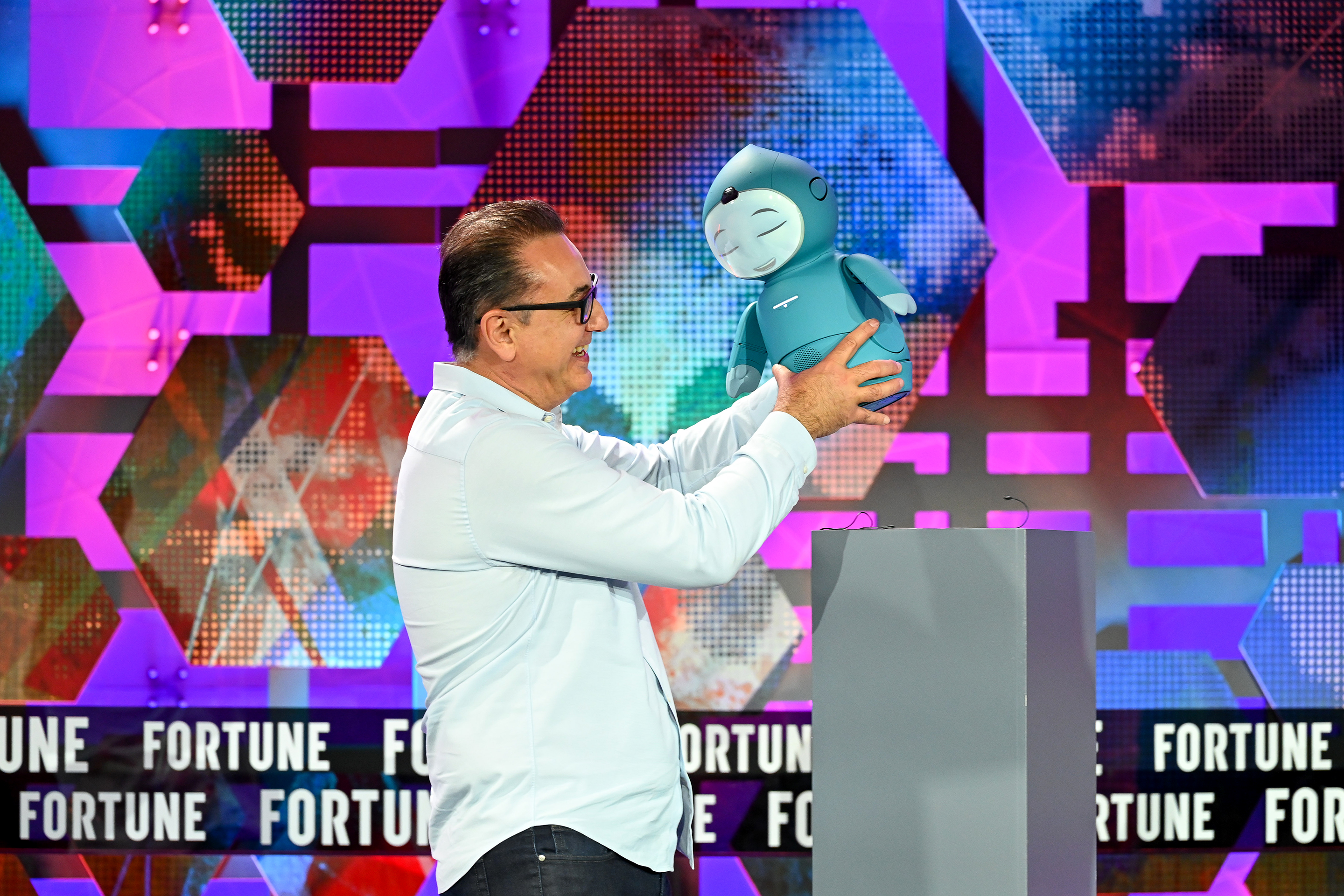 Embodied CEO and founder Paolo Pirjanian holds Moxie, an A.I.-based emotional support robot.