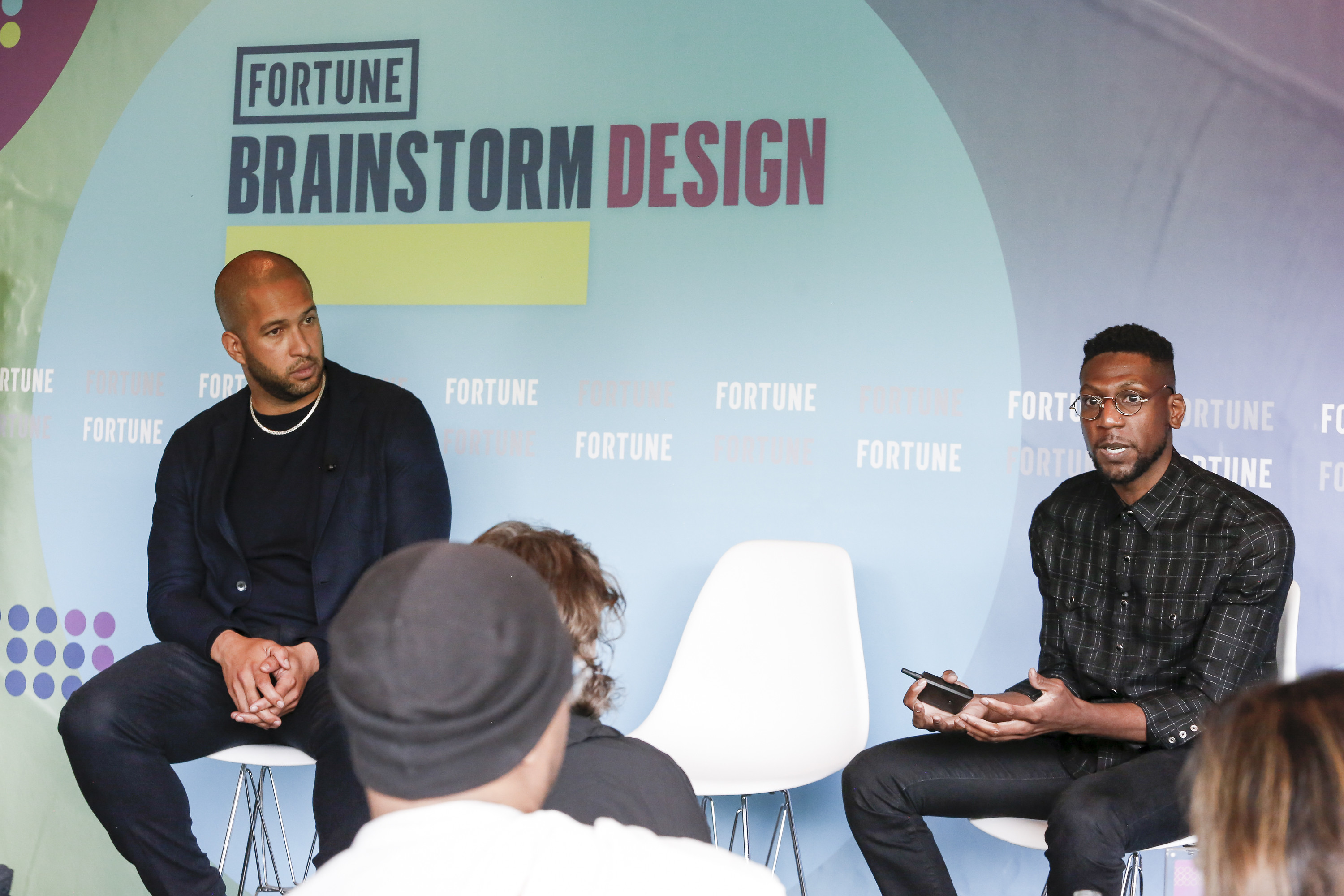 Michael Collett, founder and creative codirector of Greenworks, and Azeez Alli, cofounder of Design to Divest, speak at the Fortune Brainstorm Design conference in Brooklyn on May 24, 2022.