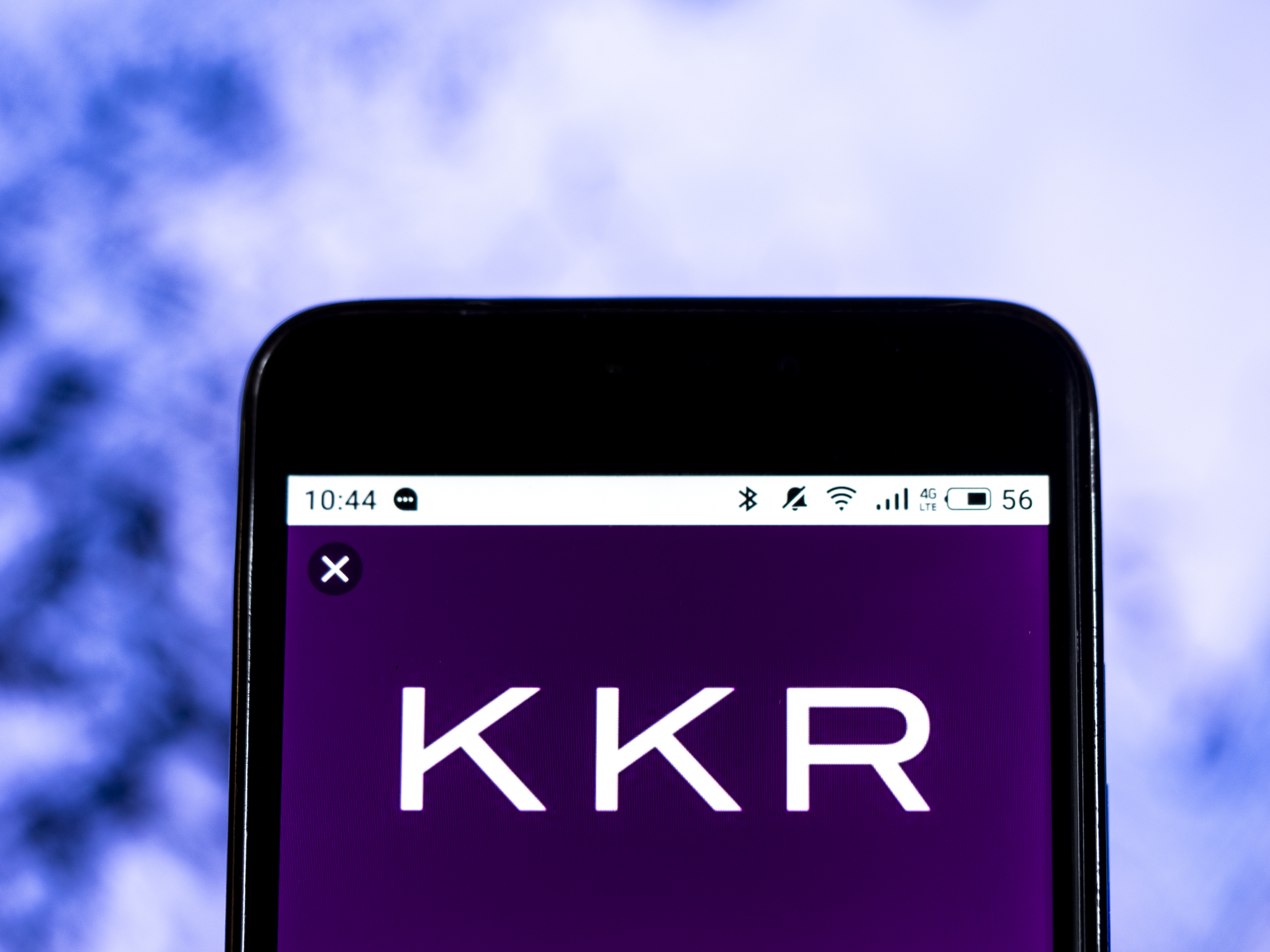 In this photo illustration, the KKR & Co. Inc. private equity company logo seen displayed on a smartphone.