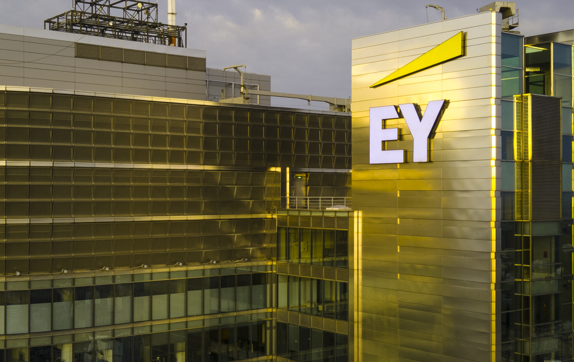 The Ernst and Young logo is seen on the Rondo 1 building on the Rondo ONZ roundabout on June 11, 2020 in Warsaw, Poland.