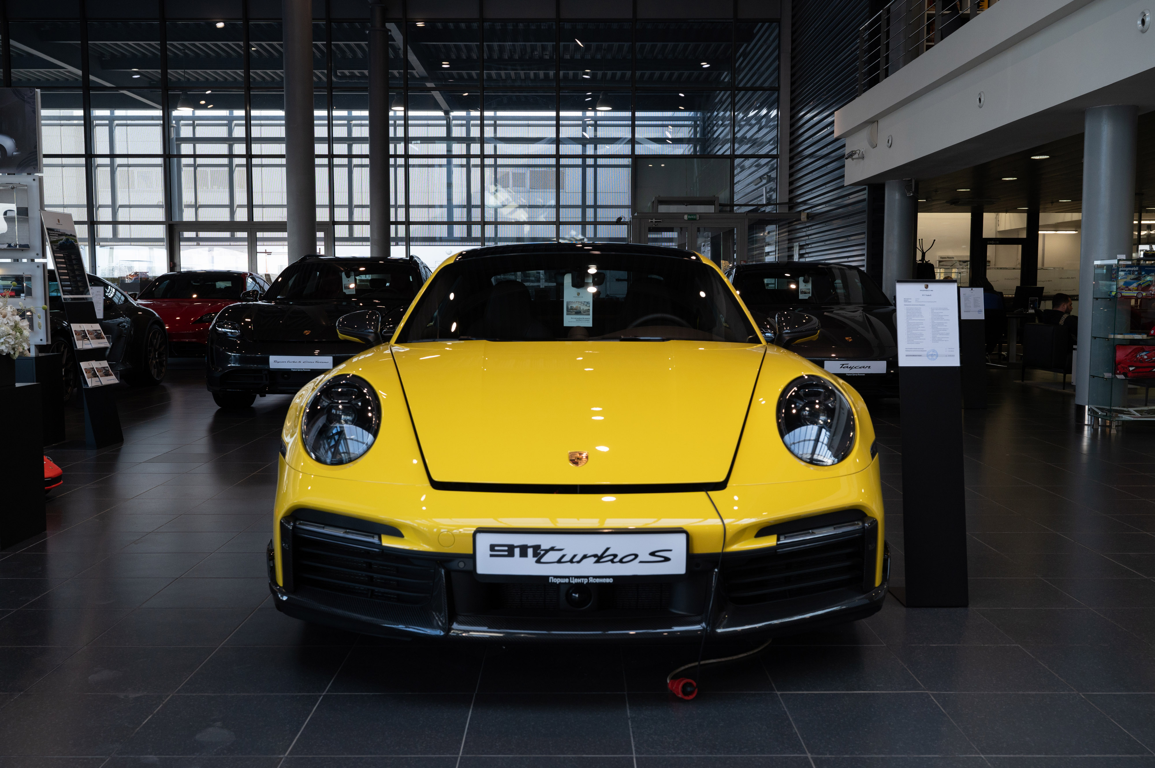 A Porsche 911 Turbo S luxury automobile at a Porsche SE dealership, operated by Rolf OOO, in Moscow, Russia, on Wednesday, Oct. 13, 2021. Russia's biggest car dealership is considering an initial public offering next year even as a Moscow region court froze its assets worth 12.85 billion rubles ($175 million) related to a criminal case against its former owner.
