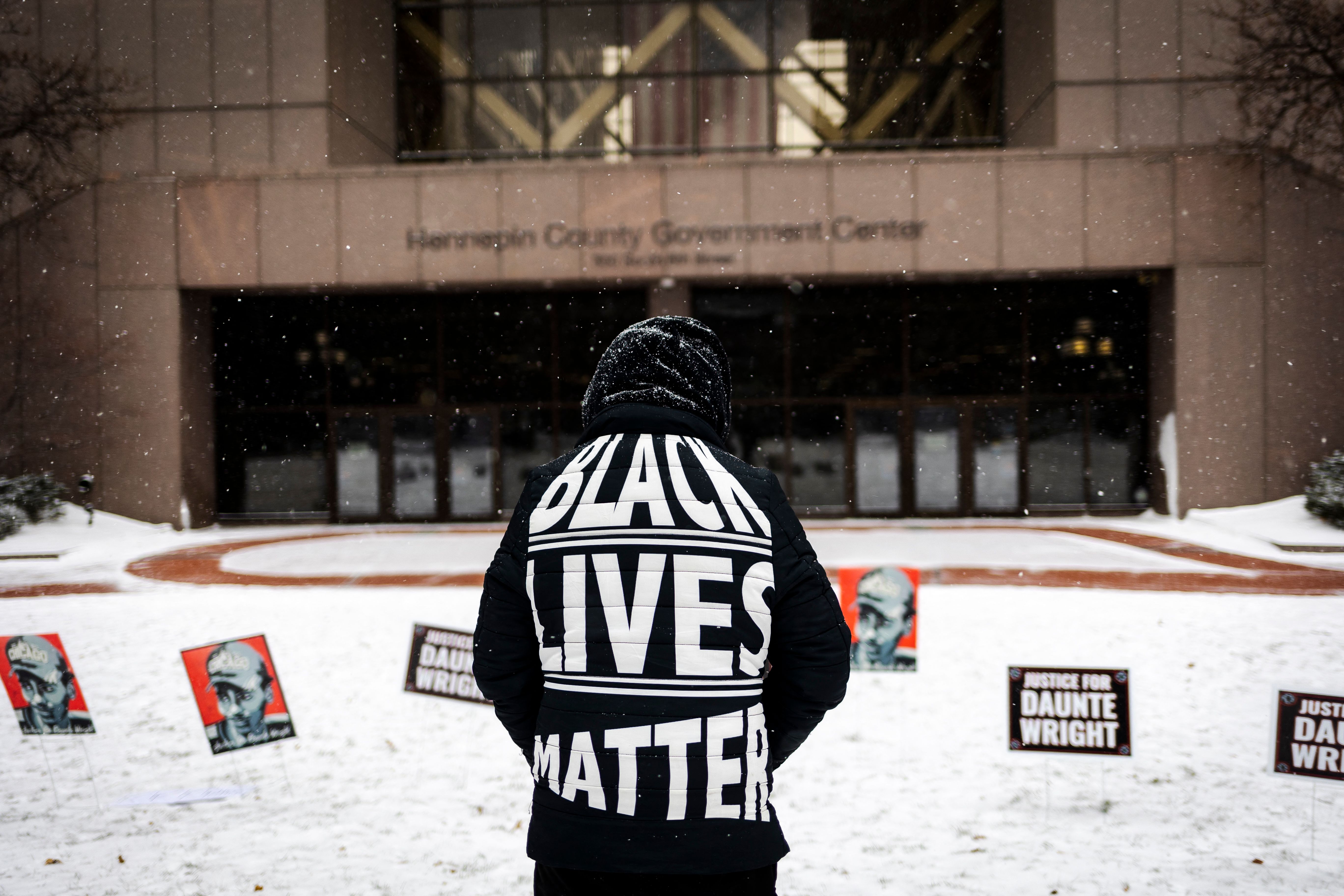 A person demonstrates in support of Daunte Wright outside the Hennepin County Government Center in Minneapolis, Minnesota, on December 21, 2021, during jury deliberations in the trial of former police officer Kim Potter.