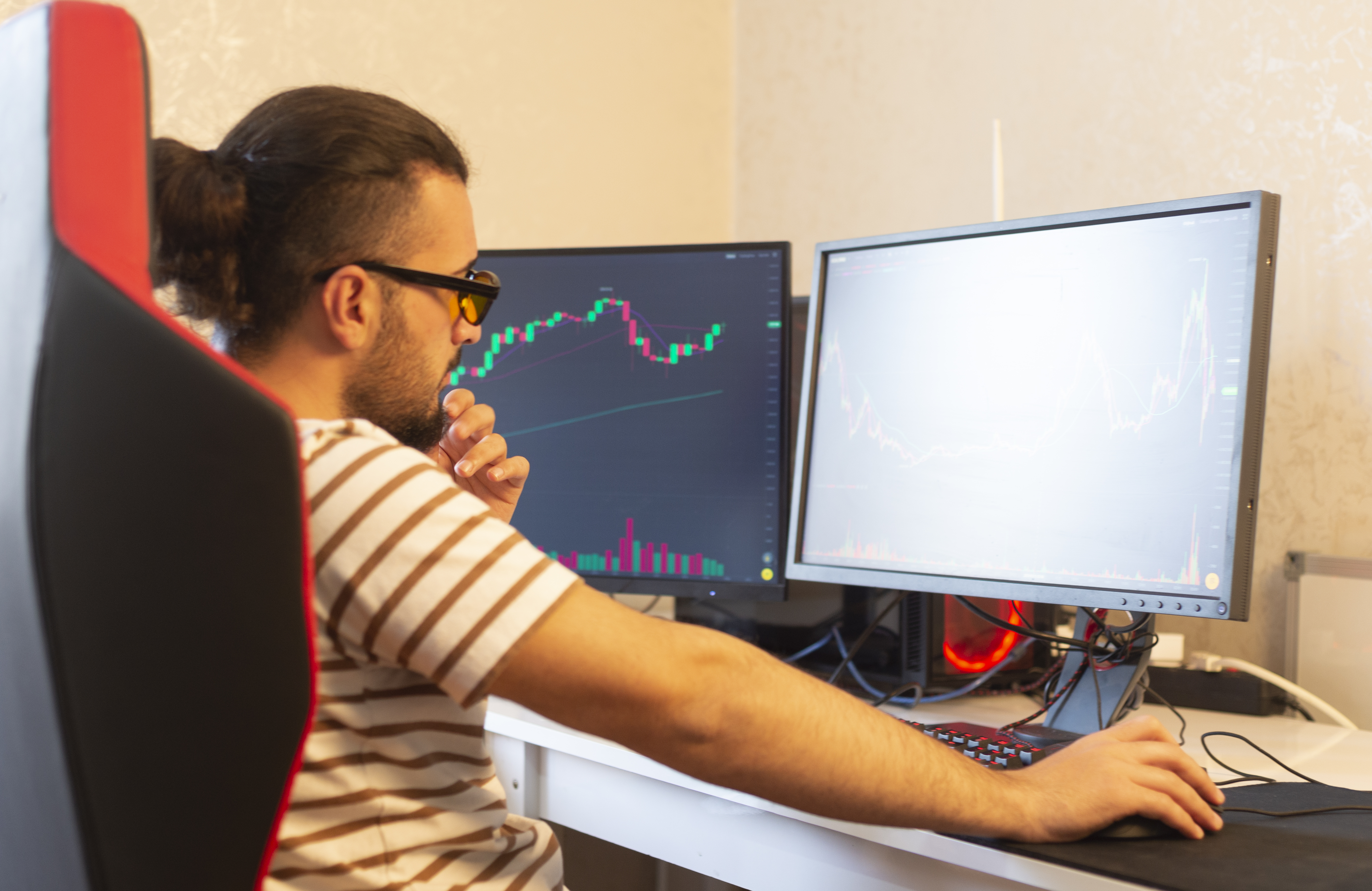 man looking at financial data
