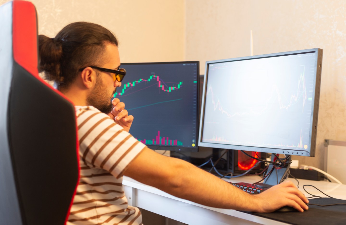 man looking at financial data