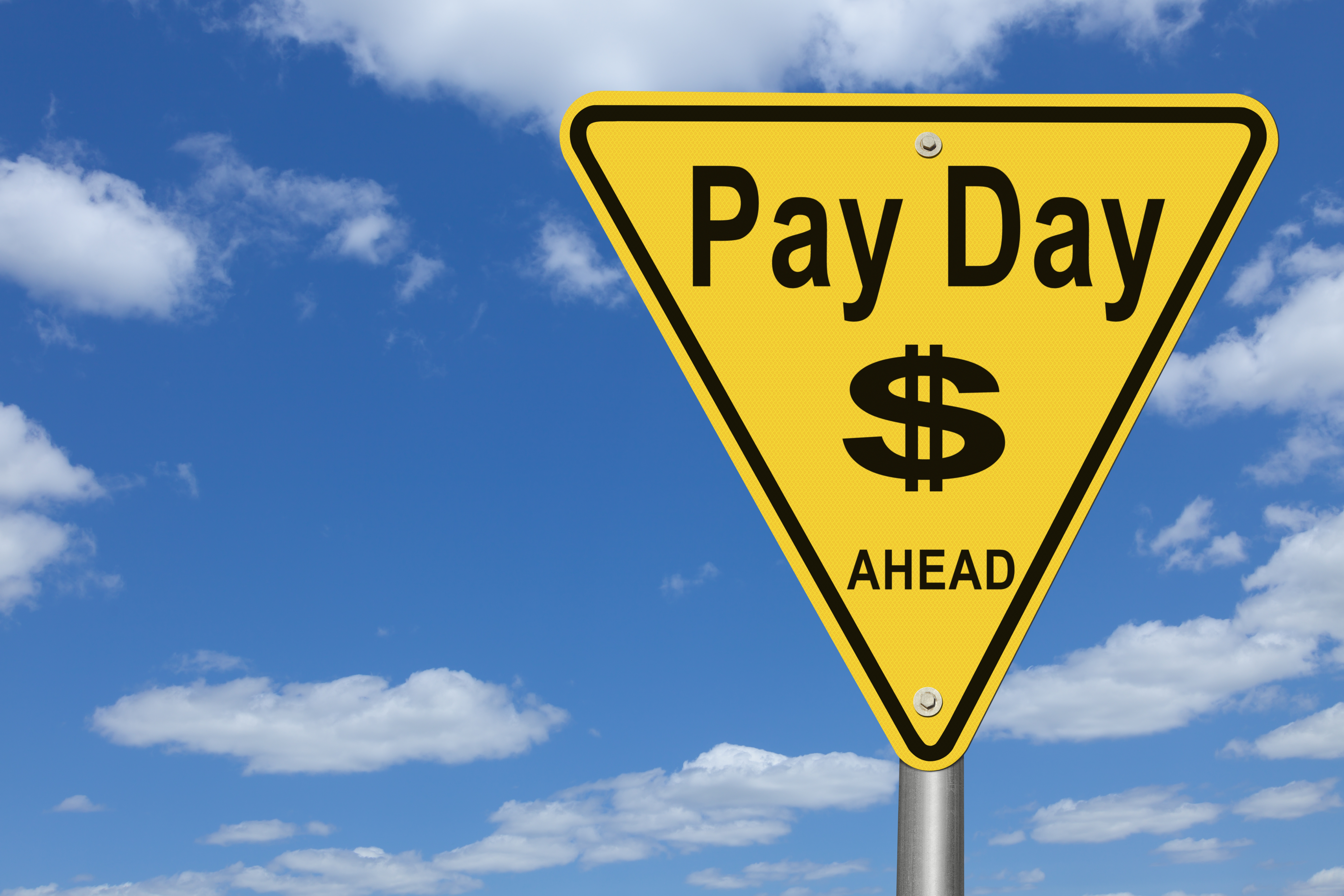 Pay Day Ahead Road Sign.