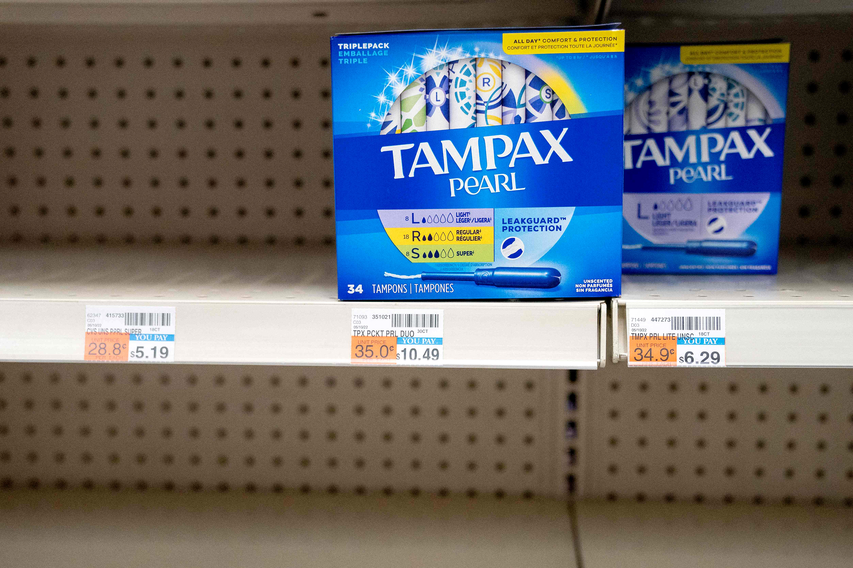 Two boxes of Tampax Pearl tampons are seen on a shelf at a store in Washington, DC, on June 14, 2022.
