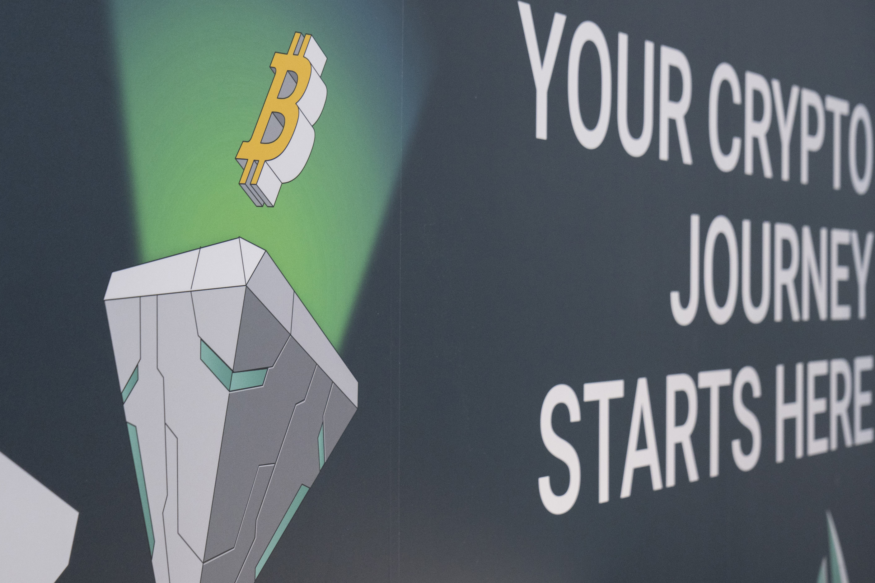 Booth poster at Crypto Expo Asia 2022 in Singapore, on June 21, 2022. 