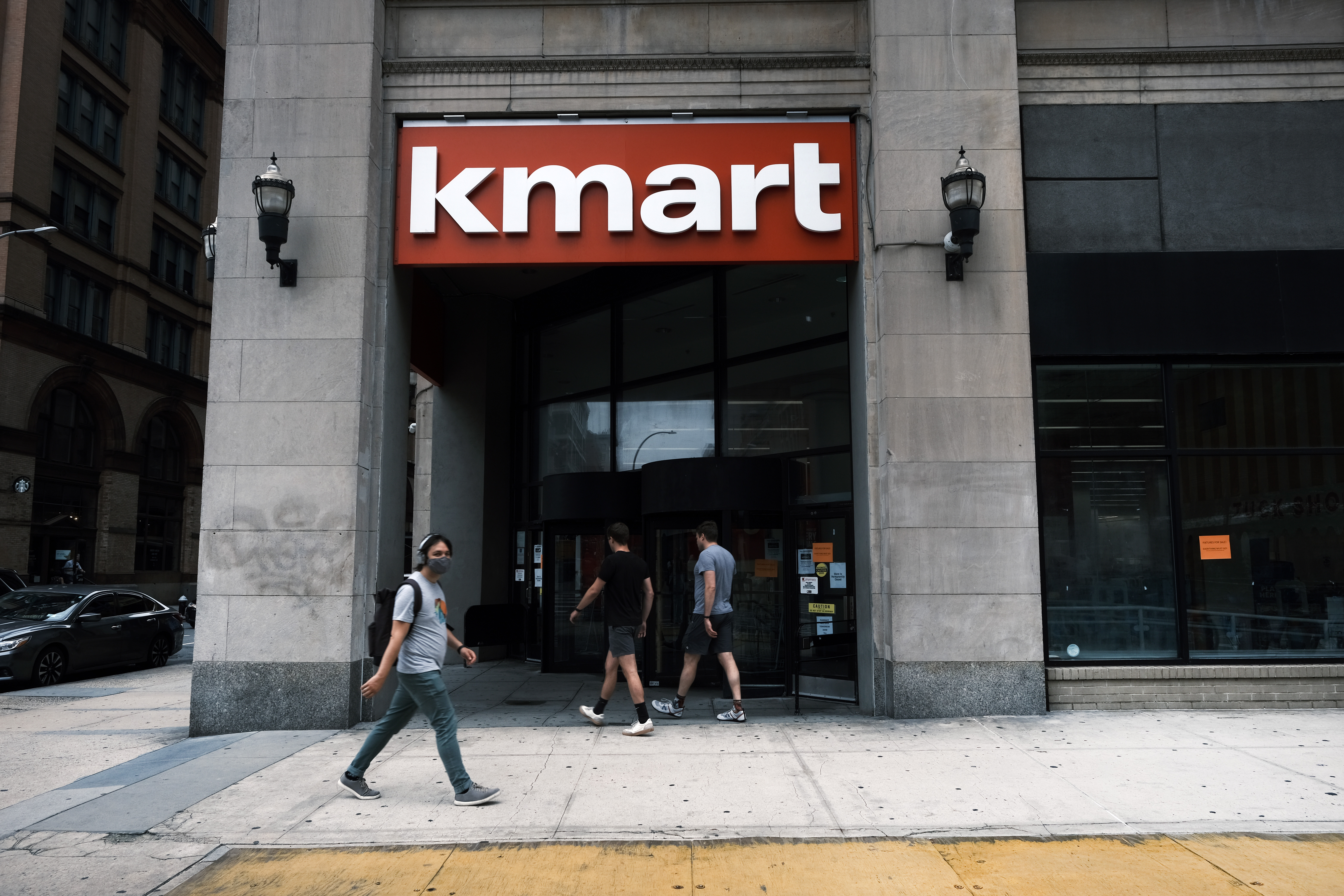 A person walking by a Kmart