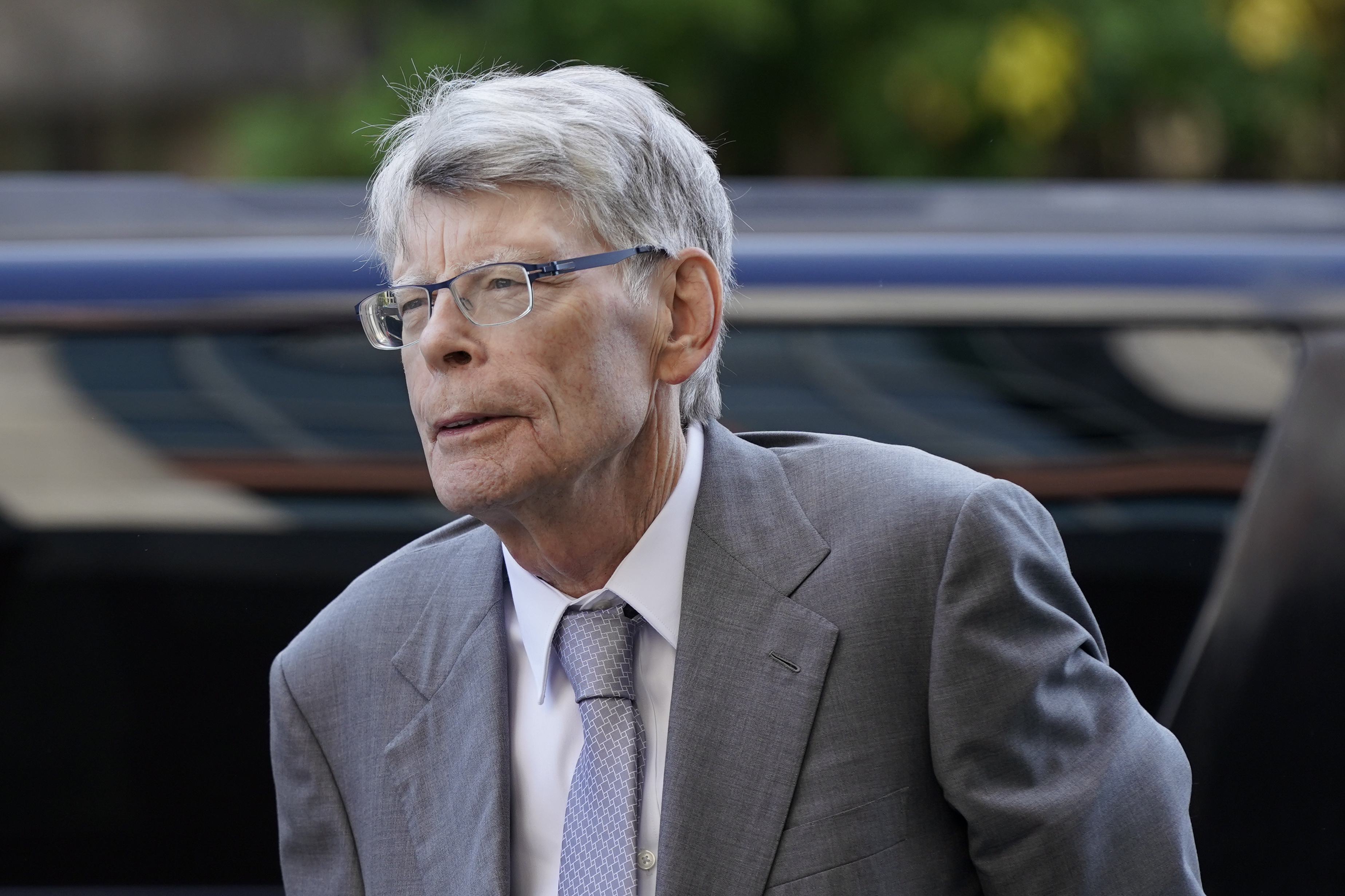 Author Stephen King arrives at federal court before testifying for the Department of Justice as it bids to block the proposed merger of two of the world's biggest publishers, Penguin Random House and Simon & Schuster, Aug. 2 in Washington.