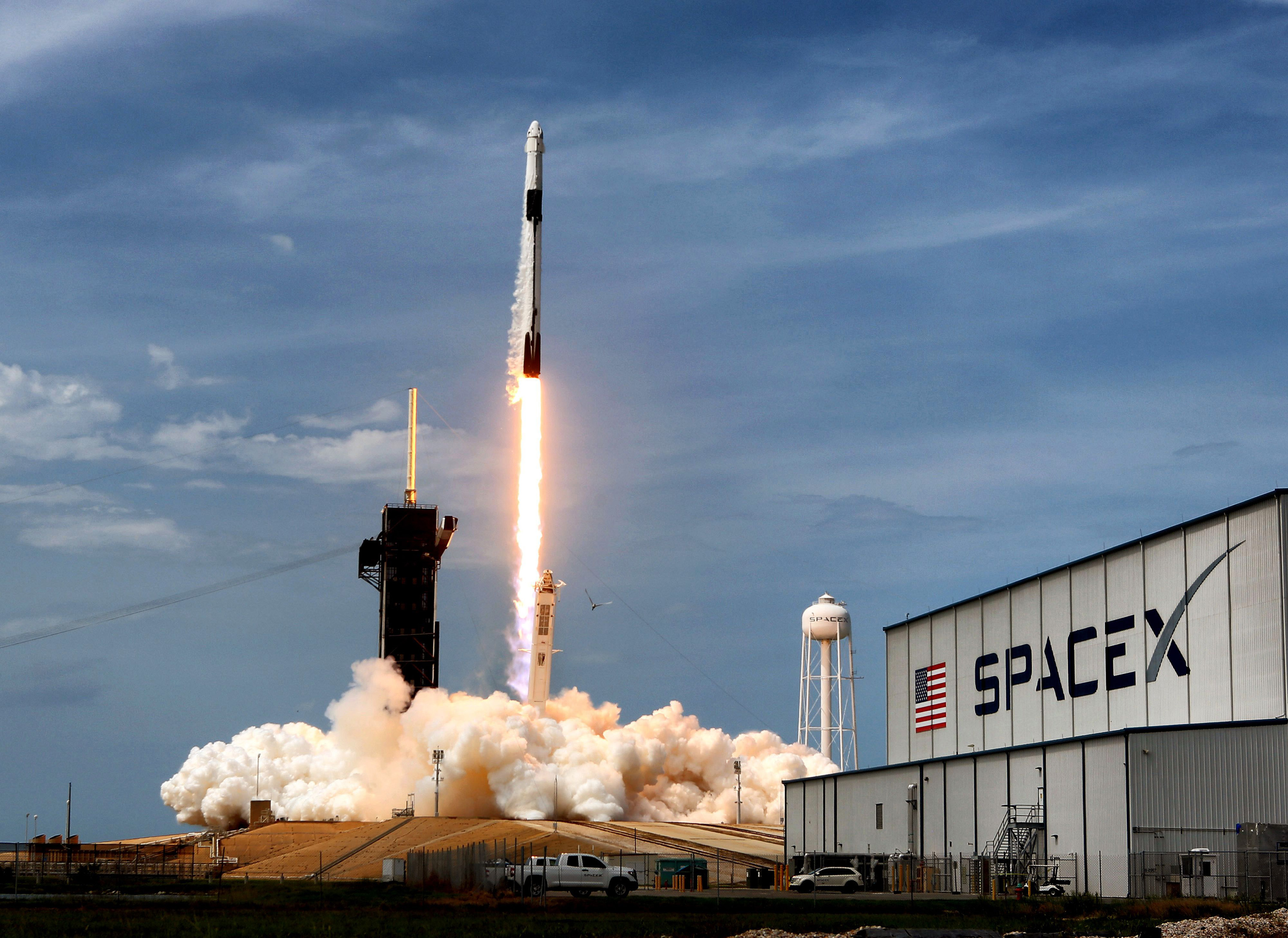 A SpaceX rocket launch carrying Starlink satellites.