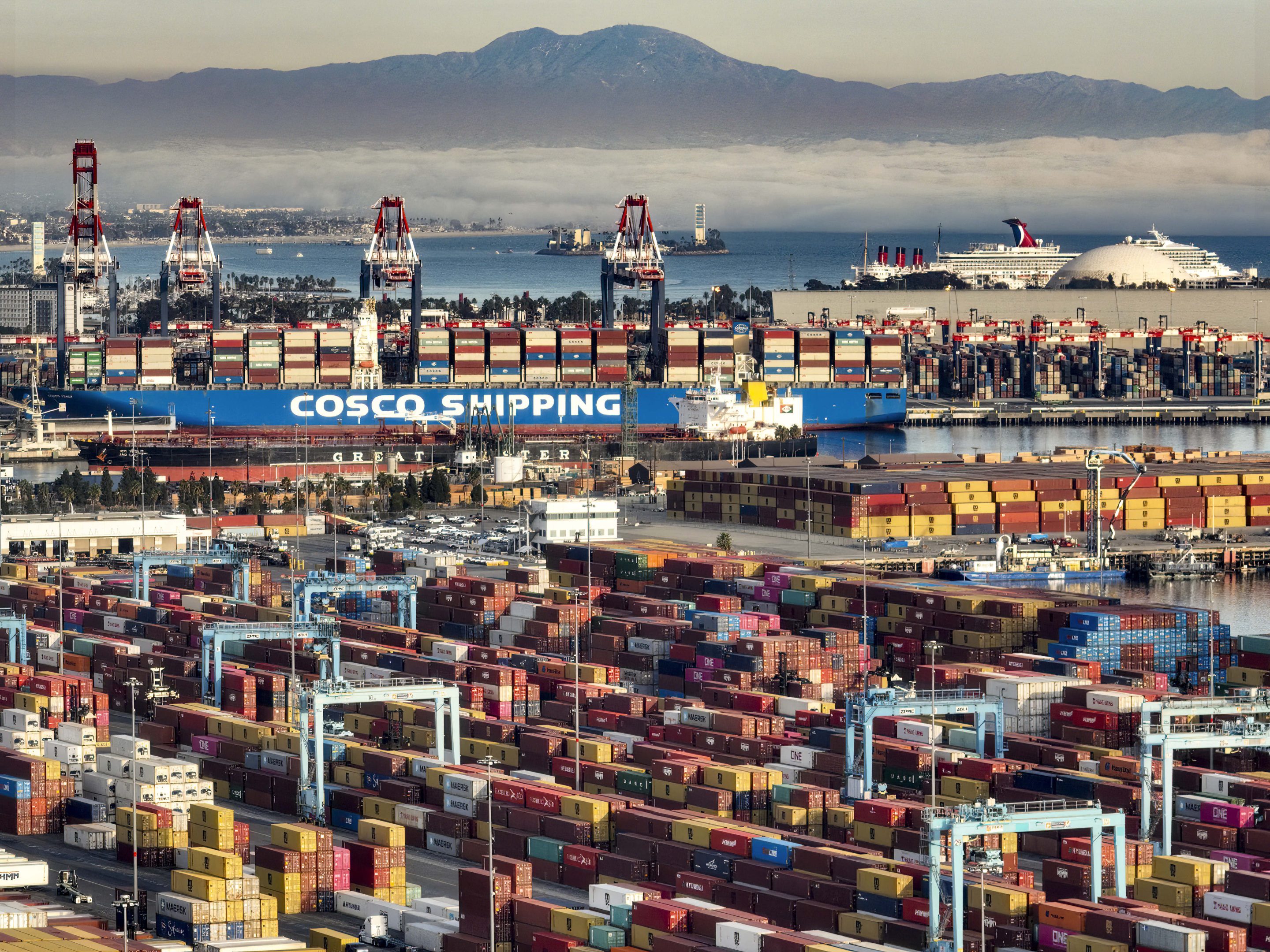 Containers are stacked up in the Port of Long Beach in California