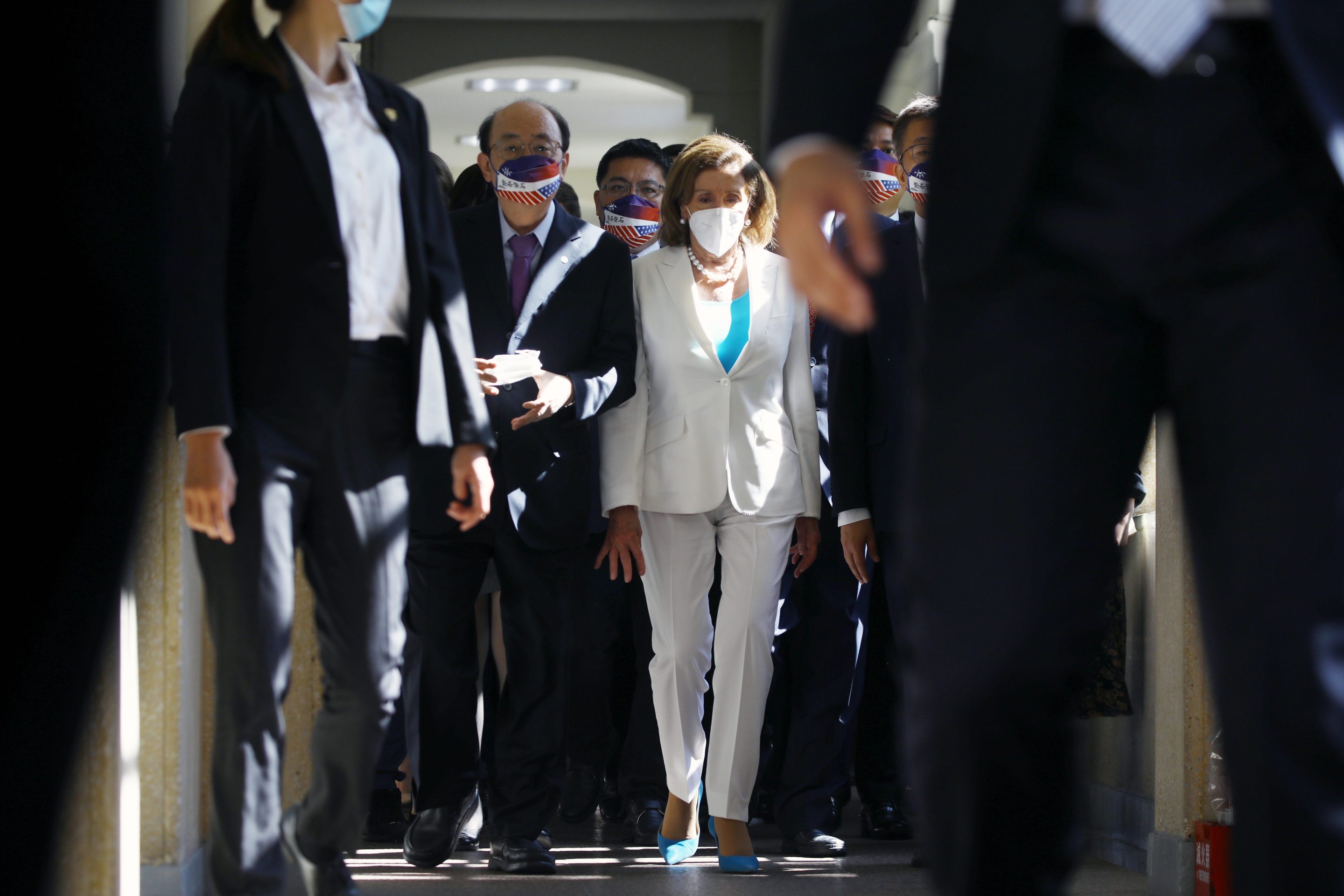U.S. House Speaker Nancy Pelosi, center, arrives at the Legislative Yuan in Taipei, Taiwan, on Aug. 3, 2022. 