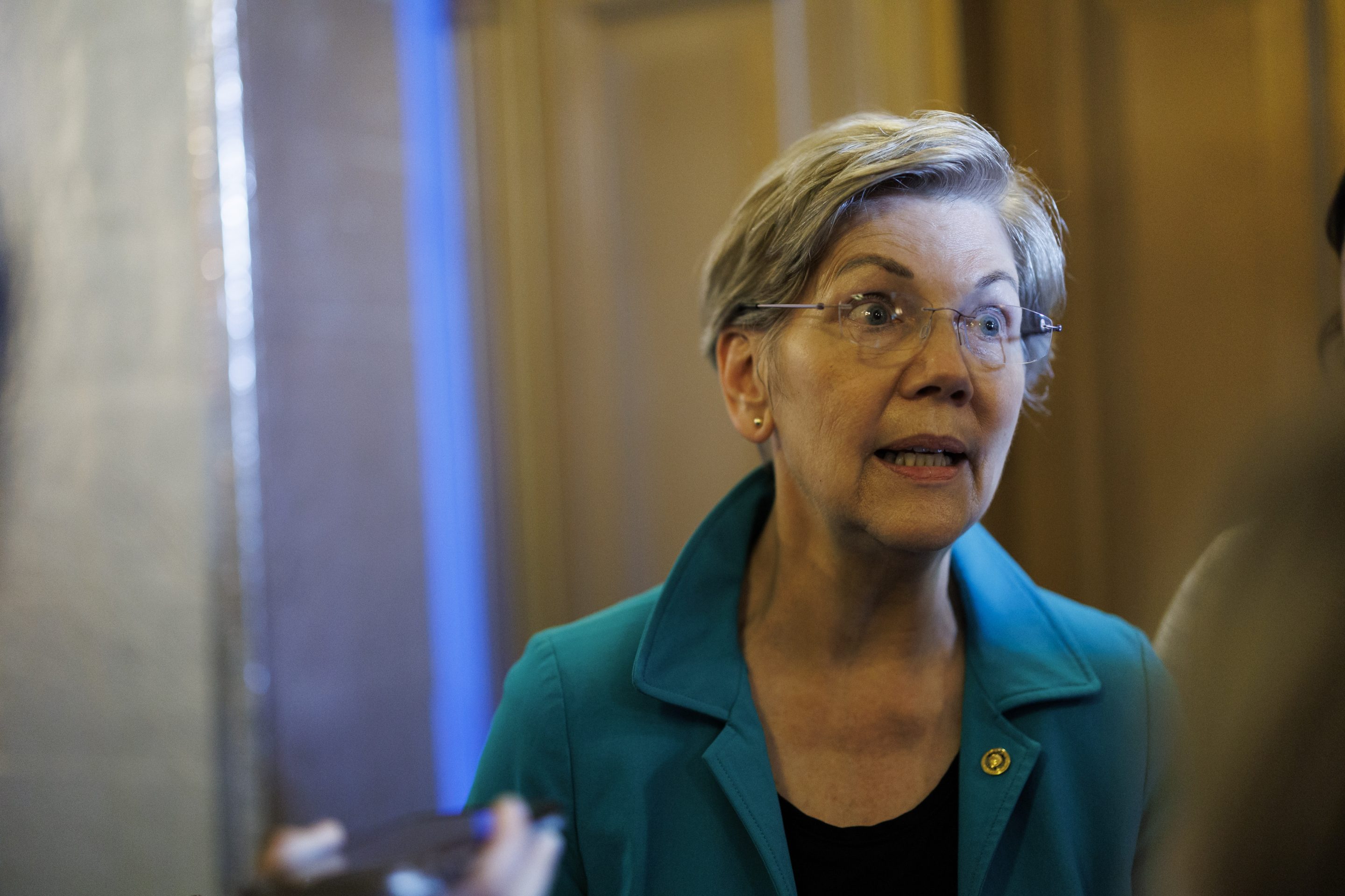 U.S. Sen. Elizabeth Warren, a Democrat from Massachusetts, speaks to members of the media on Capitol Hill in Washington, D.C., on Aug. 6.