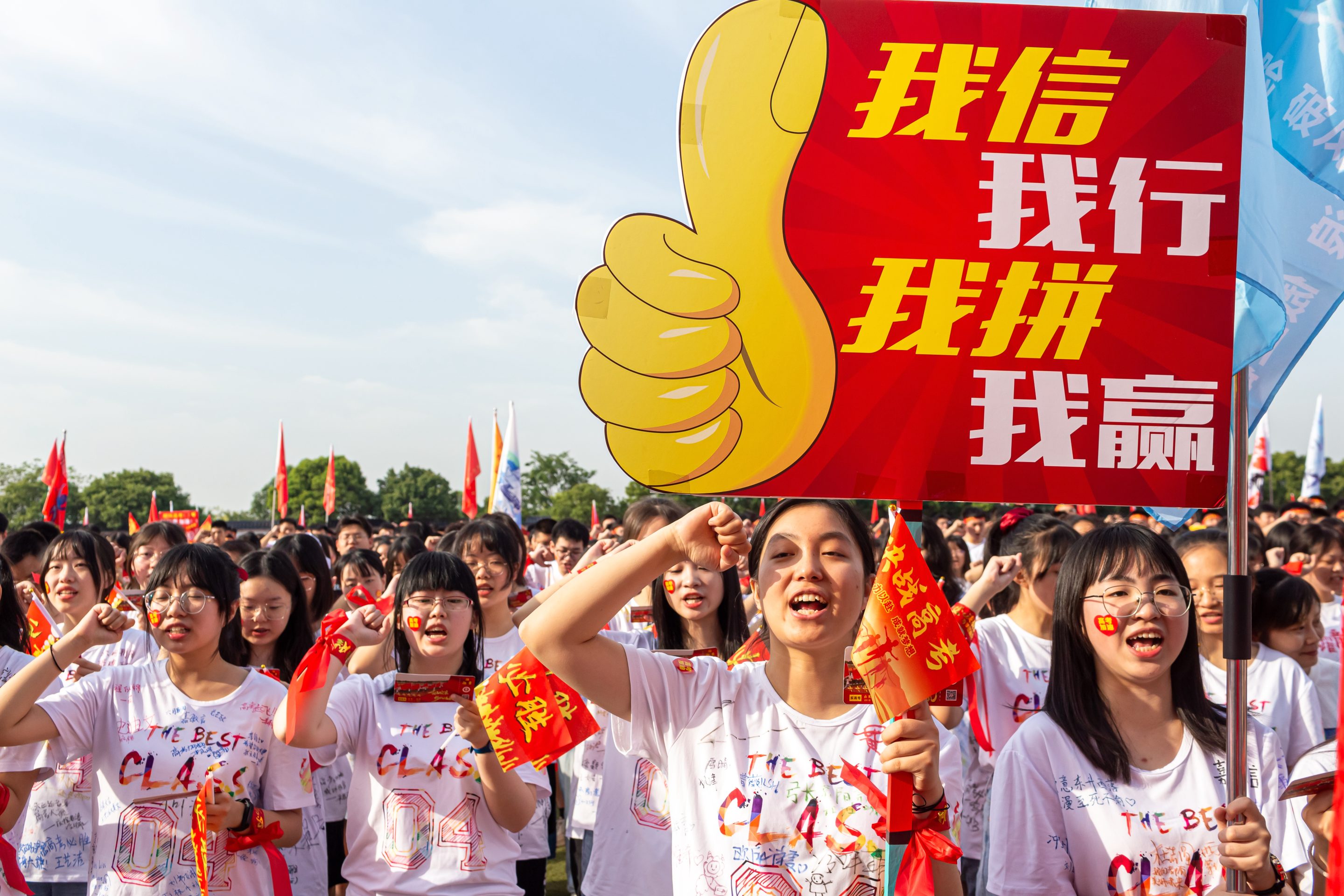 High school students participate in a motivational rally before their college entrance exams in Mianyang, Sichuan, China, on June 5, 2021. 