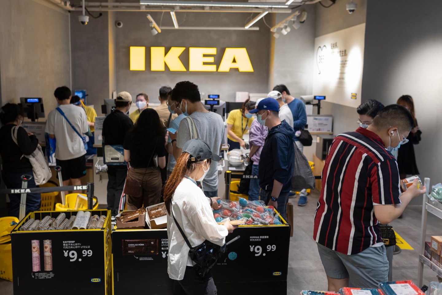 Ikea shoppers seen battling their way out of a Shanghai store after security staff tried to lock them in over COVID alert