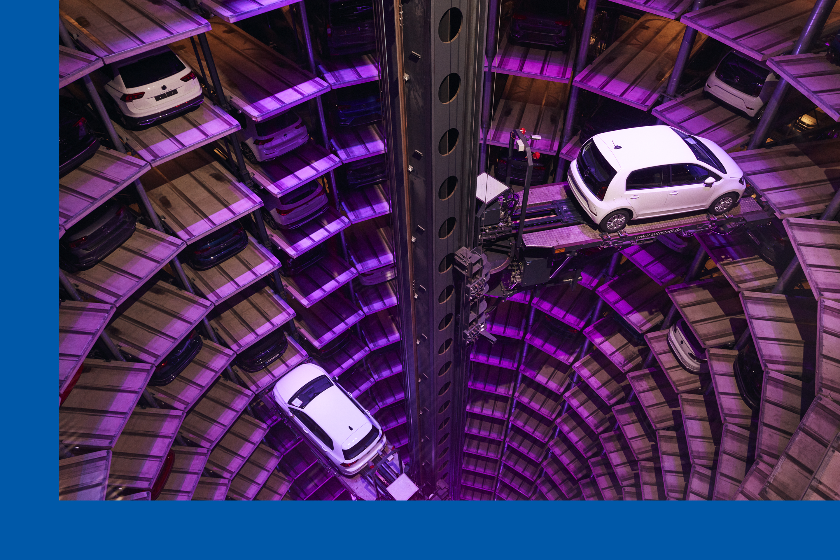 New cars being parked for customer pickup at Volkswagen’s 20-story Autostadt showroom in Wolfsburg, Germany.
