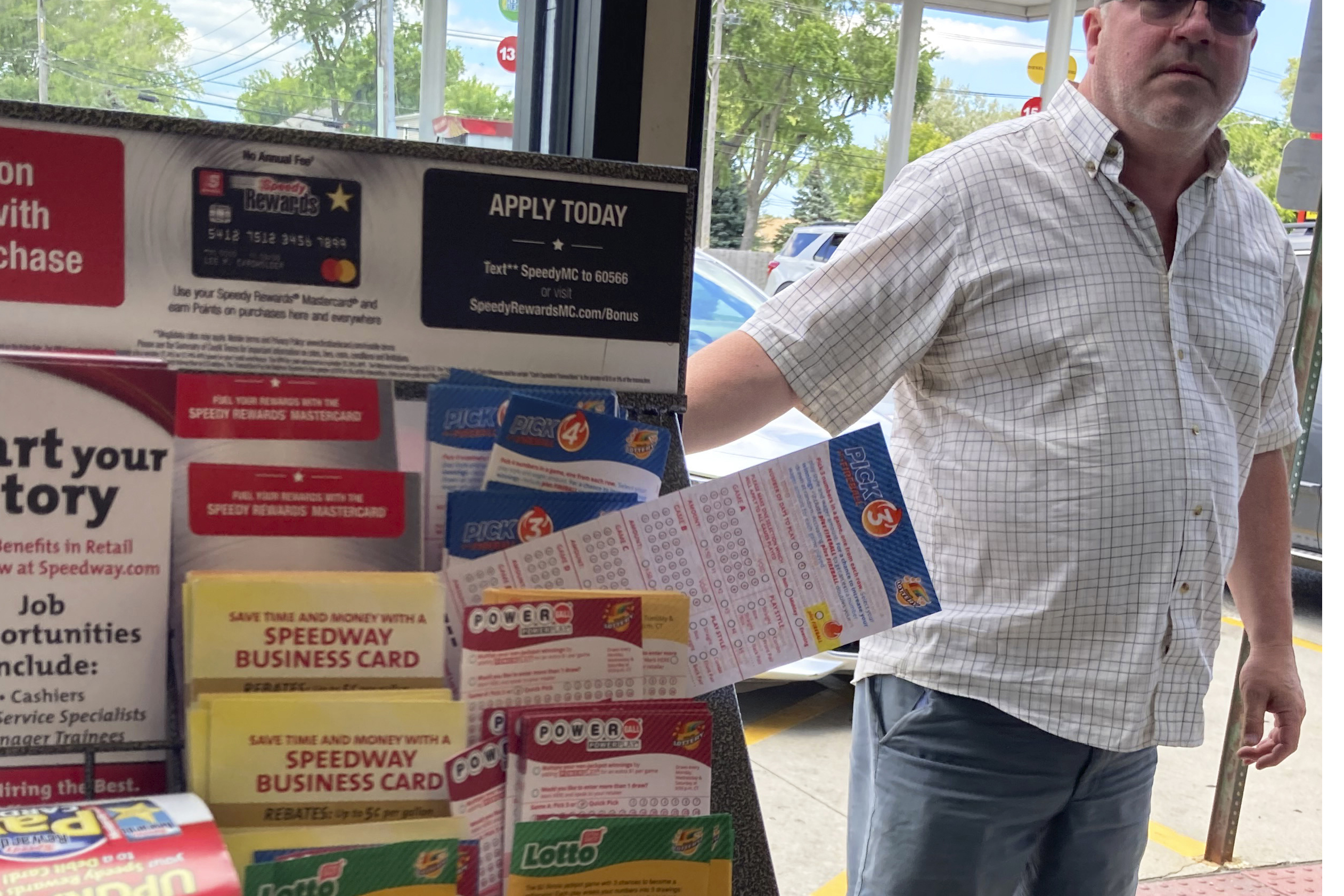 A customer walks in to the Speedway gas station in Des Plaines, Ill., where the winning Mega Millions lottery ticket was sold on July 30, 2022. Two people who wish to remain anonymous have claimed a $1.337 billion Mega Millions jackpot after a single ticket to the late July drawing was sold in the Chicago suburb, lottery officials said.
