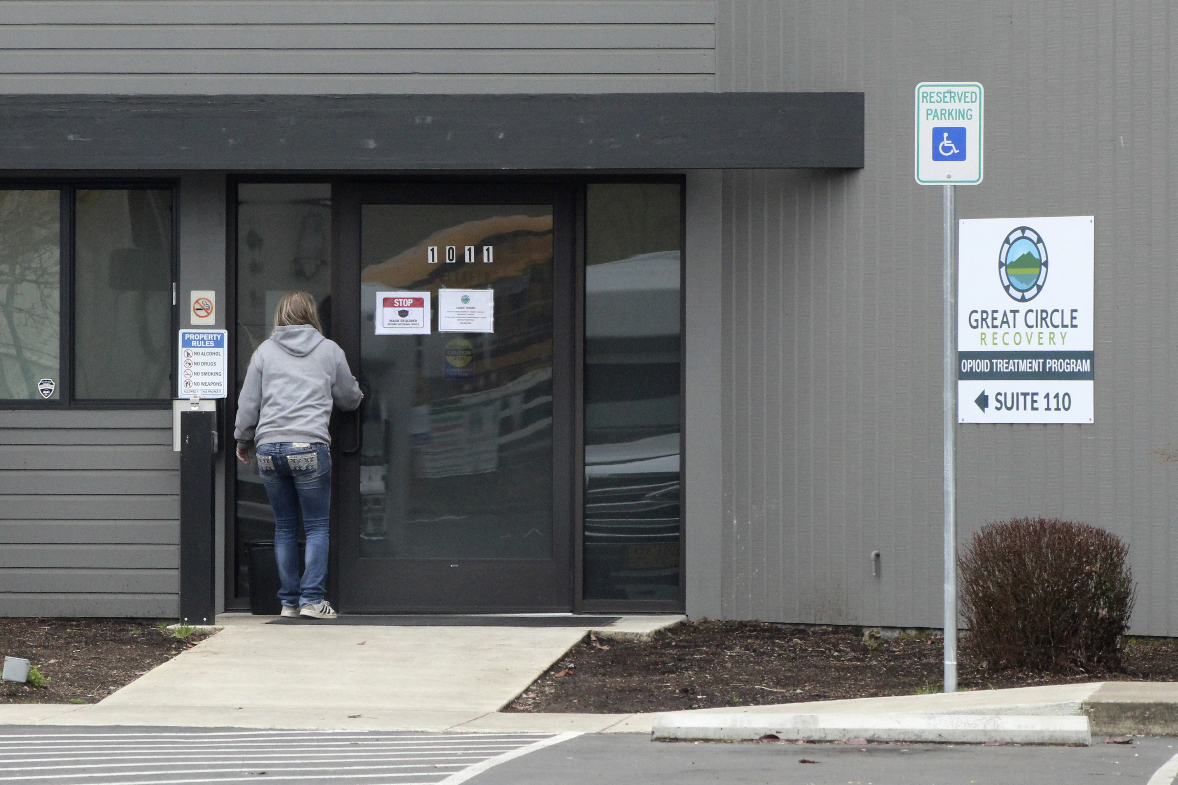 woman enters the Great Circle drug treatment center