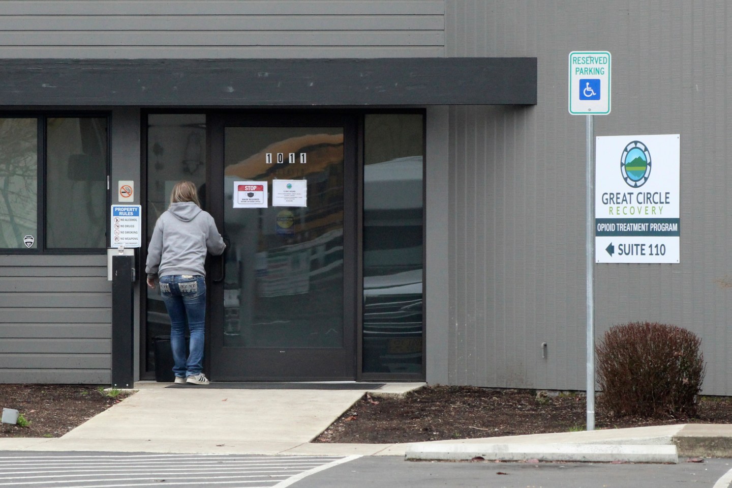 woman enters the Great Circle drug treatment center