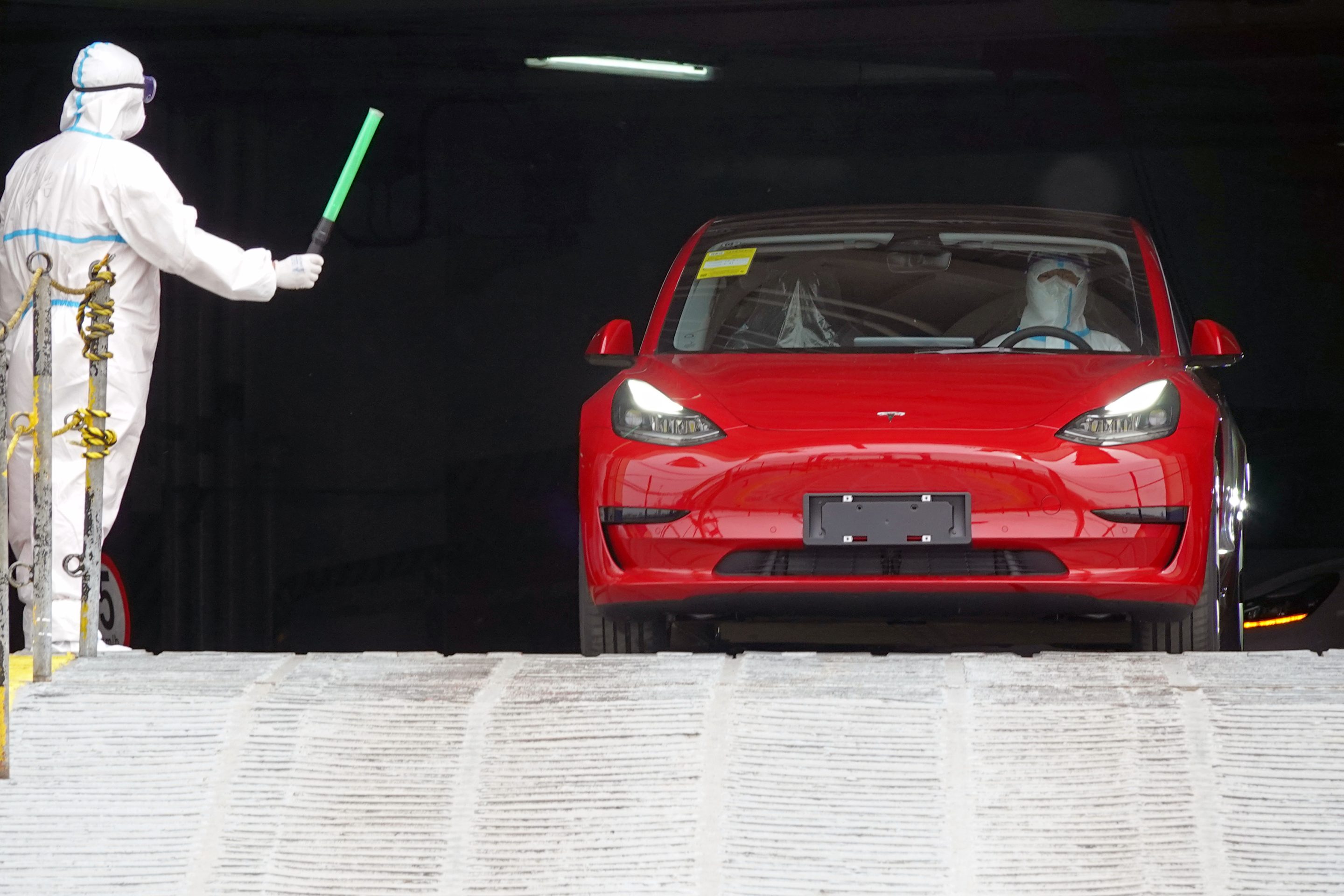 A Tesla made at the company's Shanghai Gigafactory exits a ship in April after a COVID resurgence led to a production stoppage.