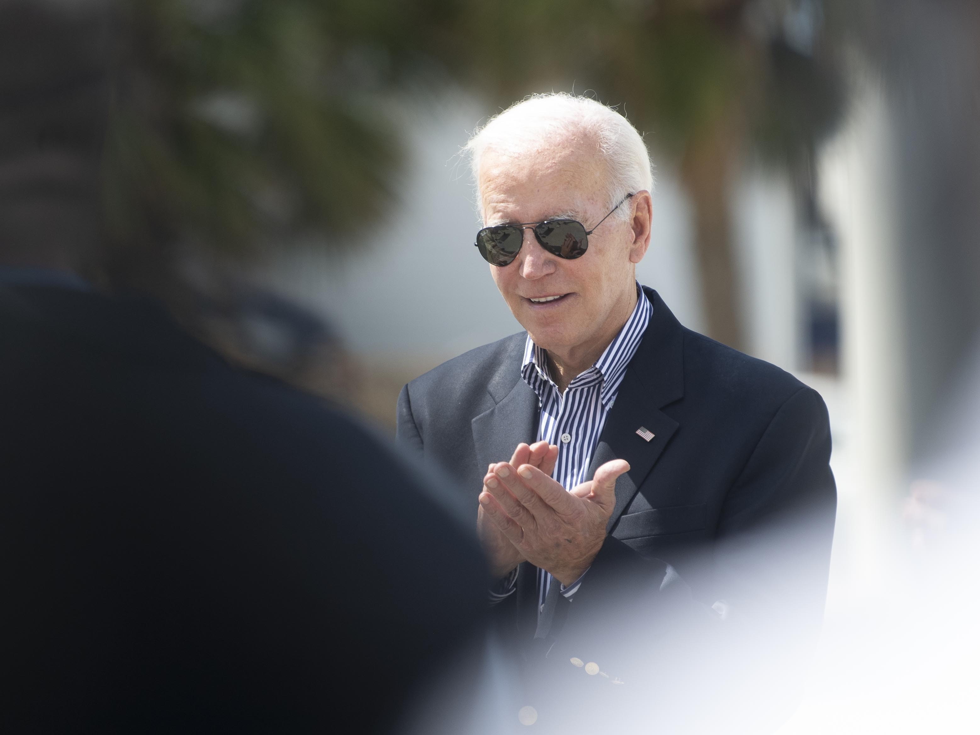 President Joe Biden visits Fisherman's Wharf at Fort Myers Beach, Fla., on Oct. 5, 2022, to see the damage caused by Hurricane Ian.