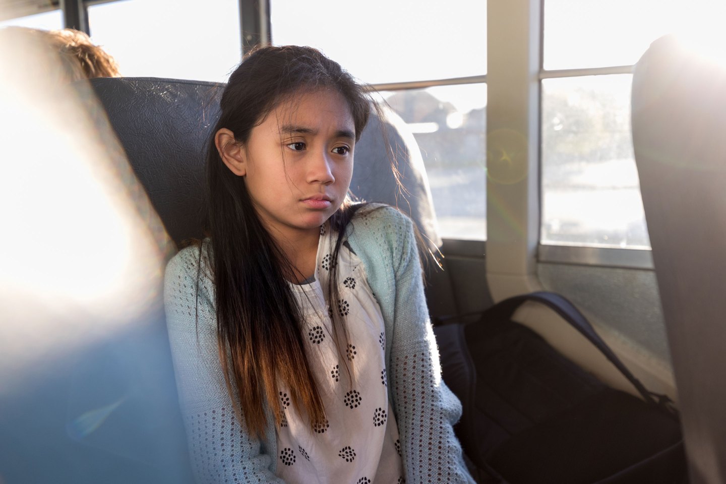 Young girl on a school bus