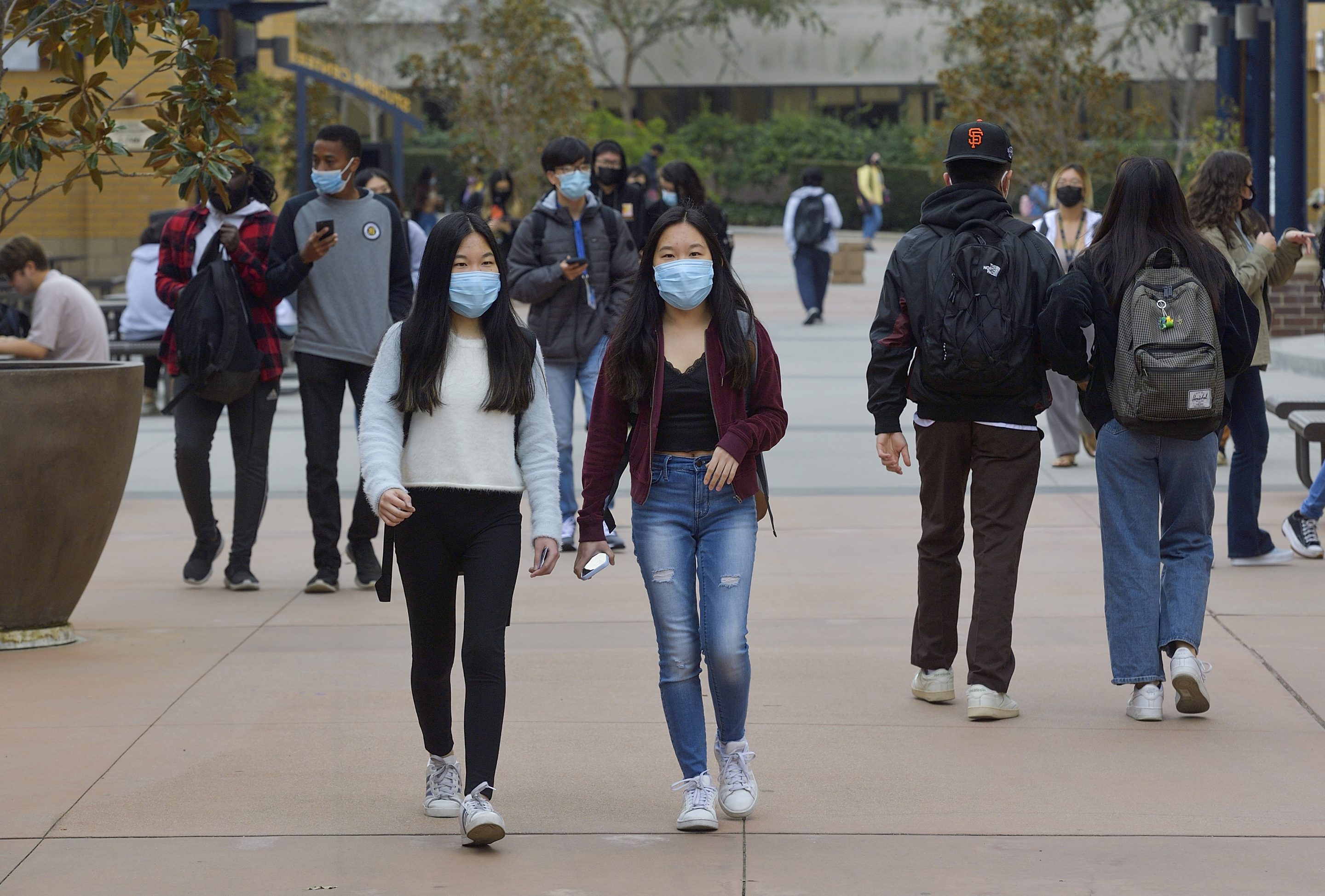 Photo of students on UCI's campus.
