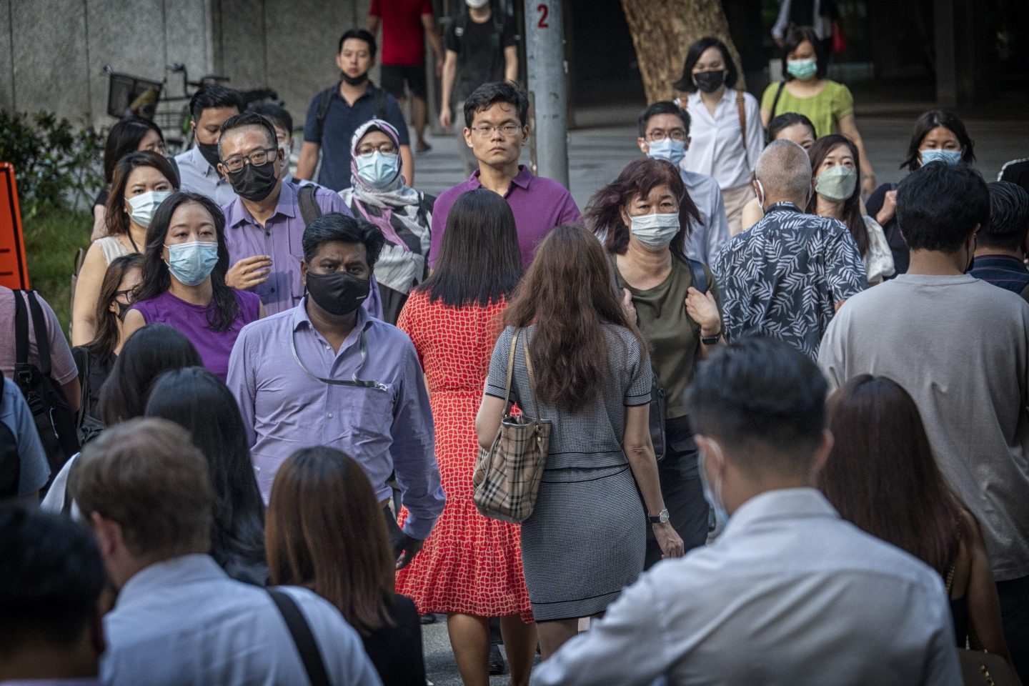 Masked pedestrians in Singapore in April 2022