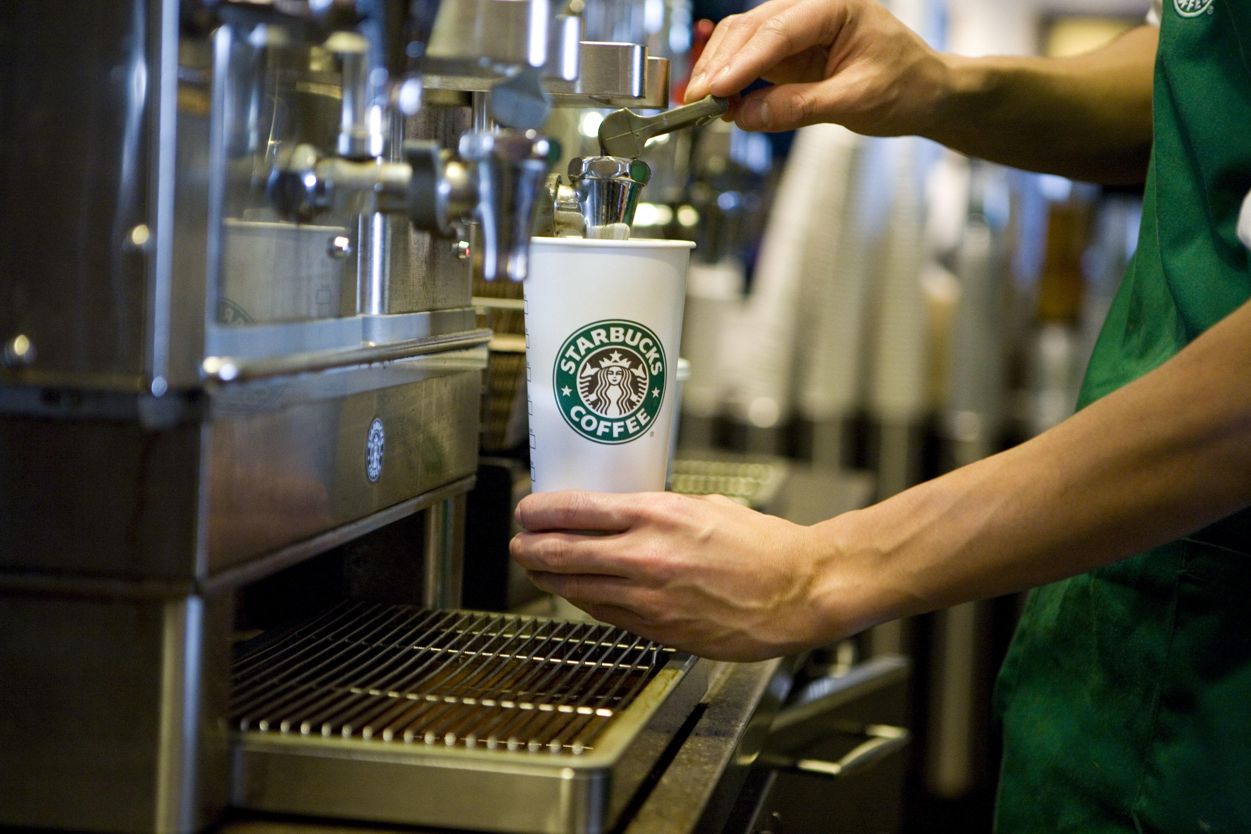 A Starbucks barista prepares a drink at a Starbucks coffee shop in New York on January 13, 2010.