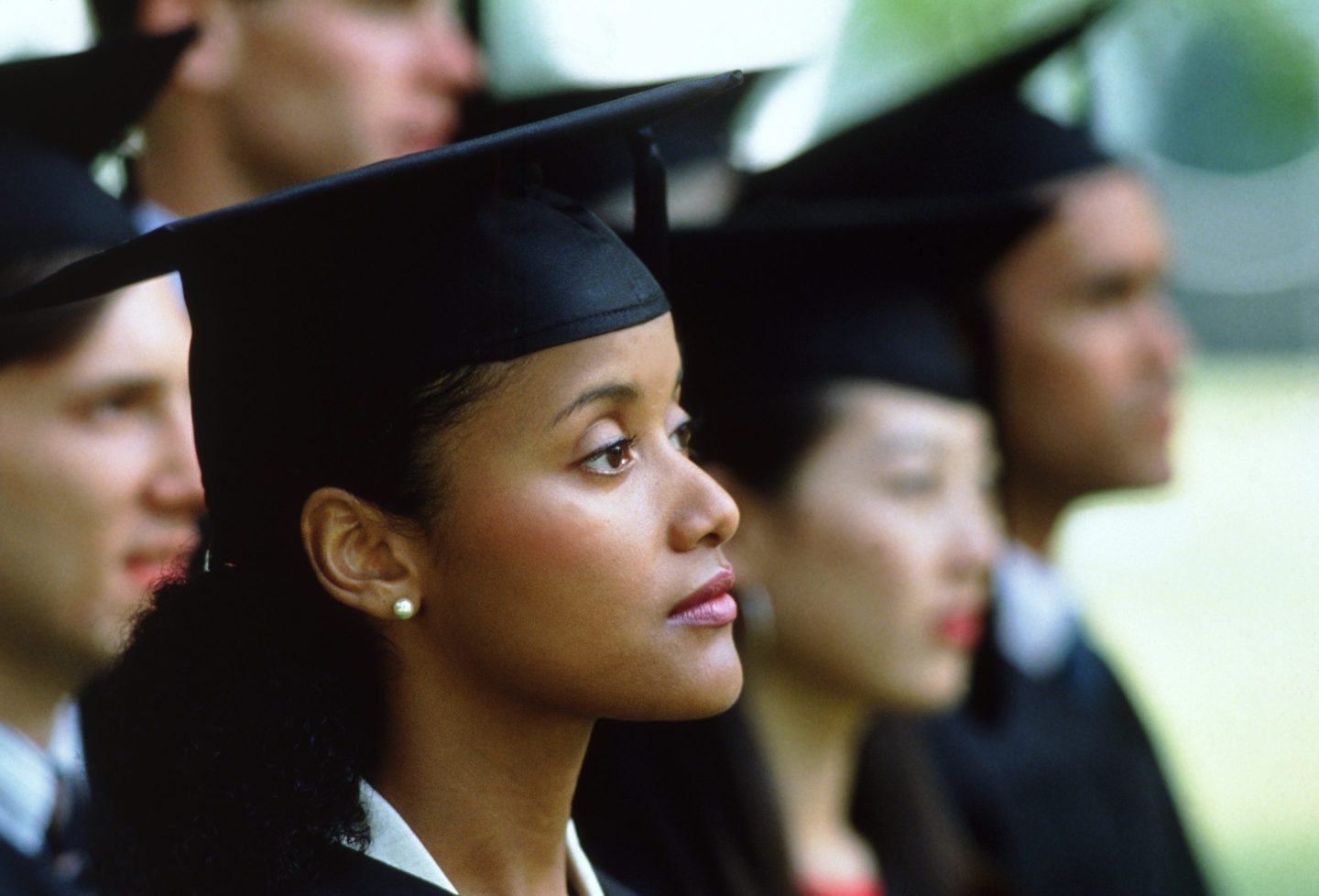graduate in cap and gown
