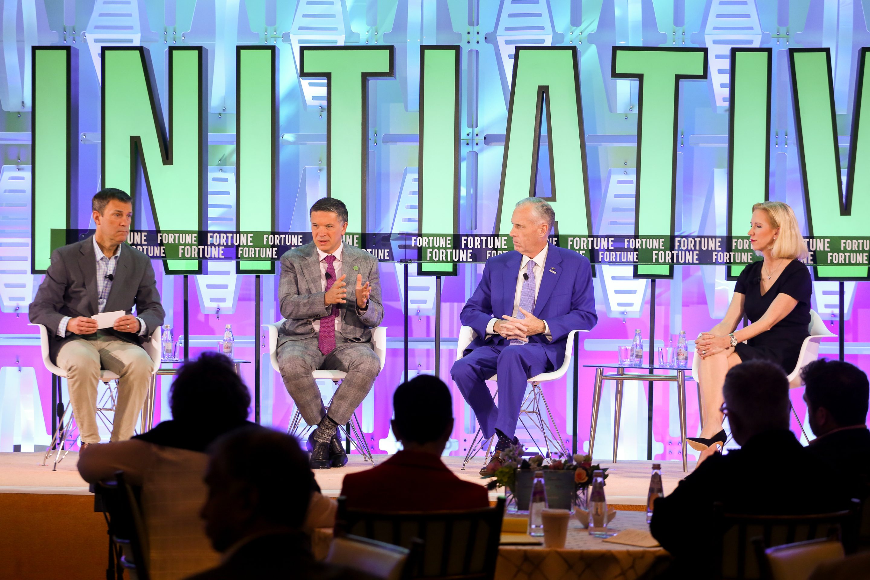 AB InBev CEO Michel Doukeris, Dow CEO Jim Fitterling, and Marriott International president Stephanie Linnartz speak with Fortune executive editor Matt Heimer at the Fortune CEO Initiative conference in Palm Beach, on Nov. 3, 2022. 