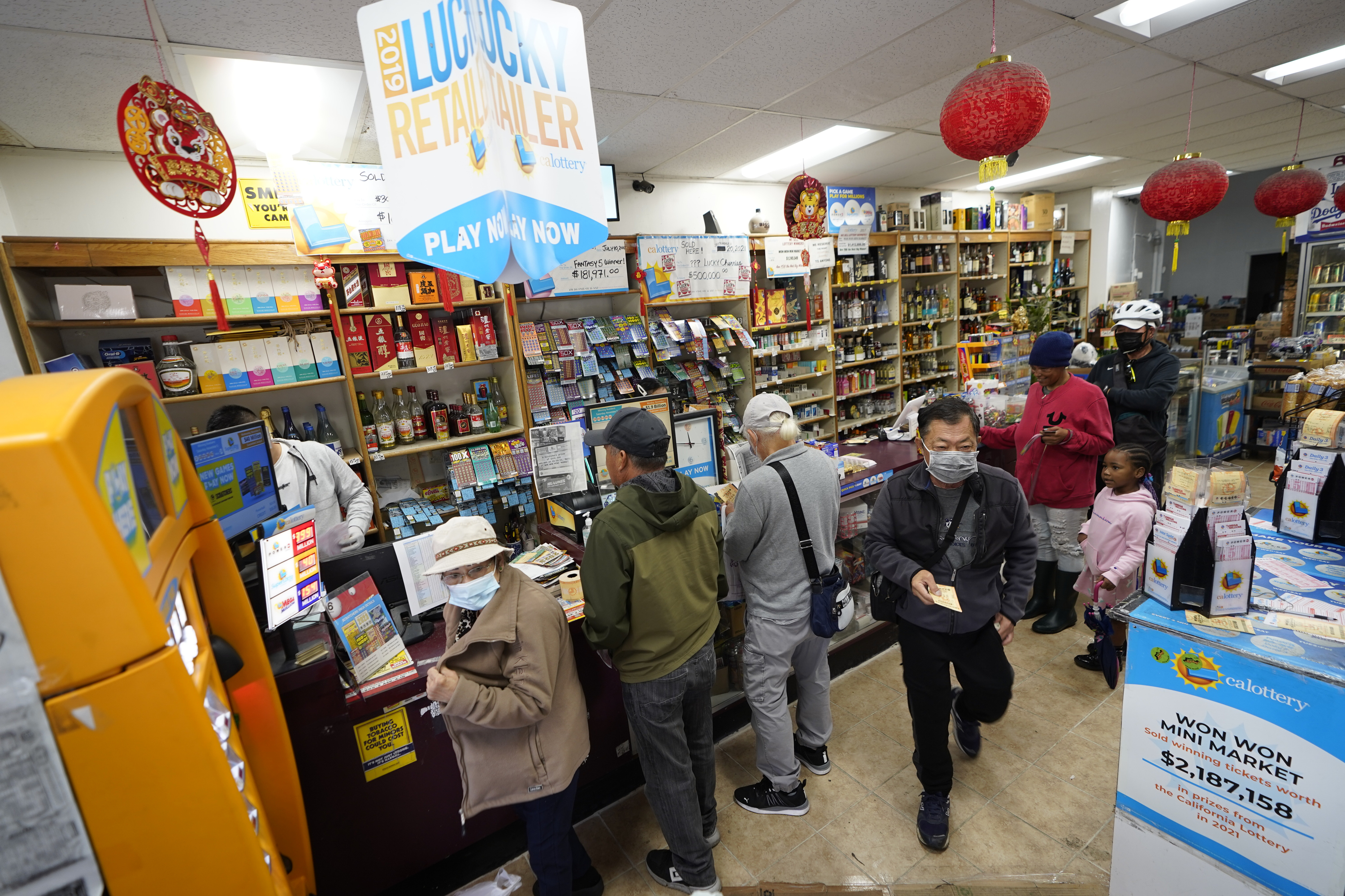 People standing in line to buy lottery tickets.