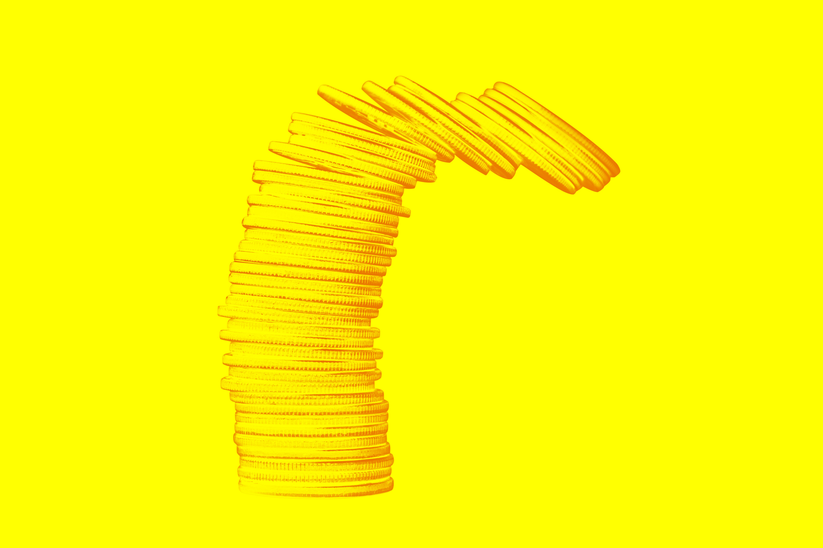 Stack of coins falling over