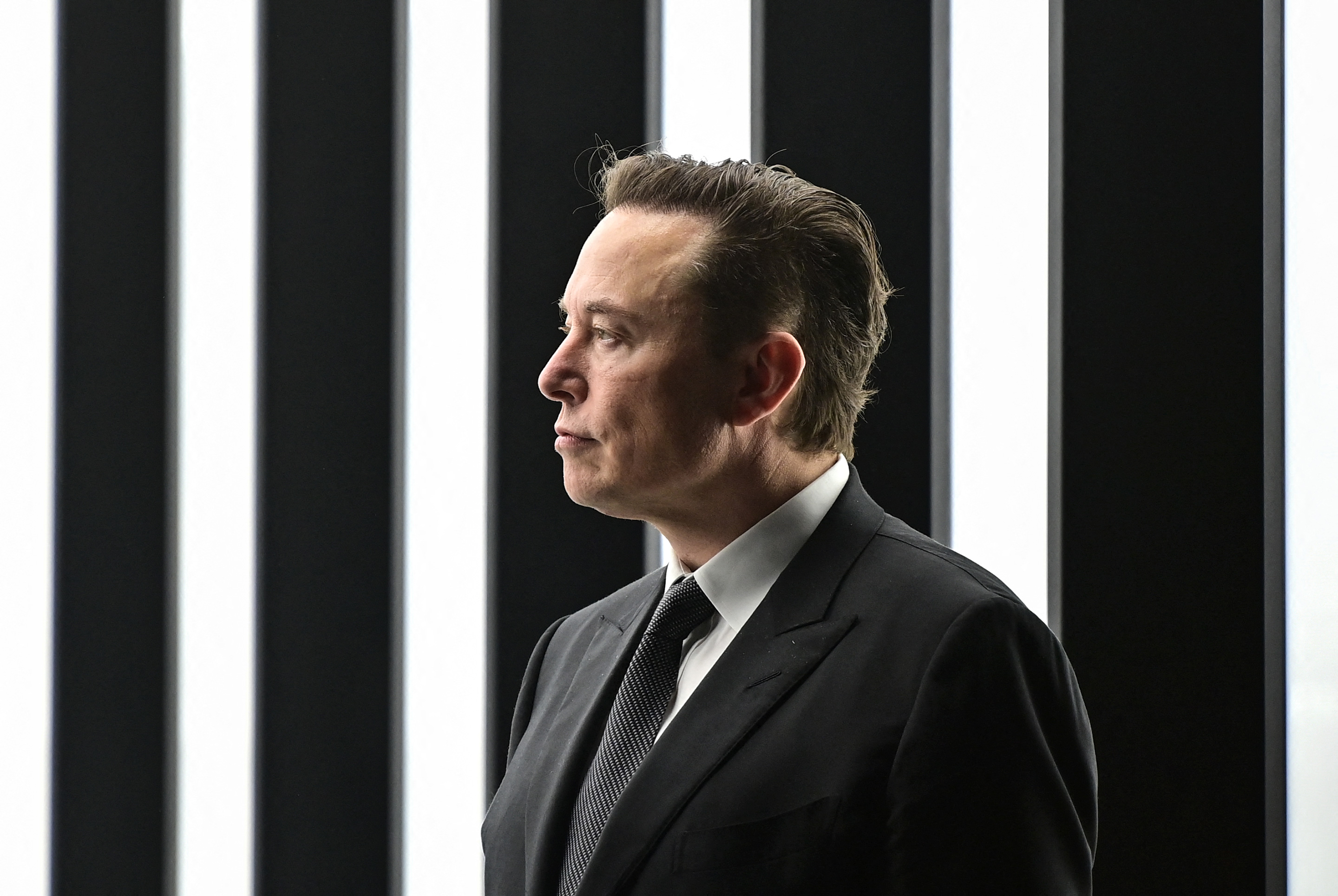 Tesla CEO Elon Musk is pictured as he attends the start of the production at Tesla's "Gigafactory" on March 22, 2022 .