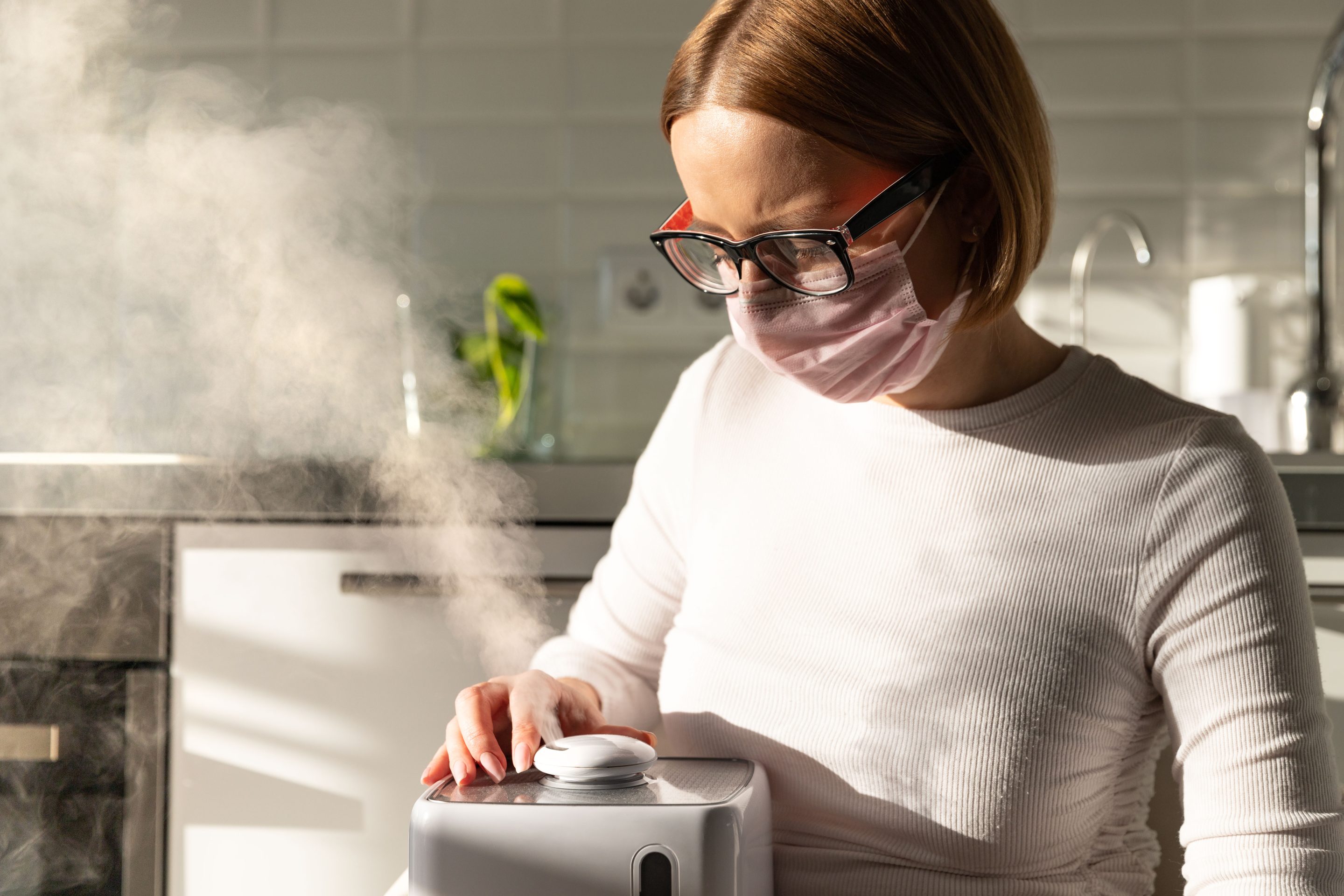 Woman with humidifier