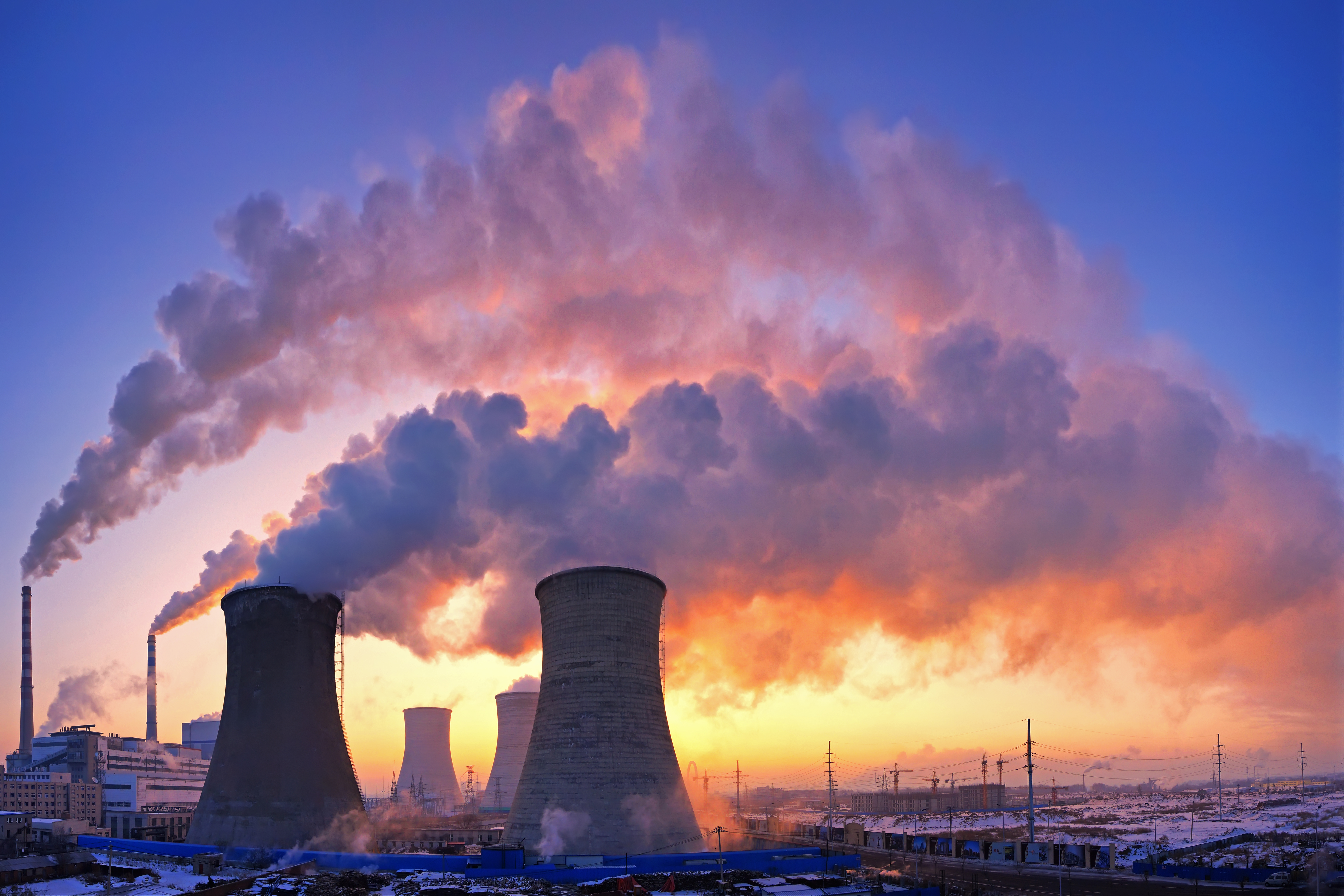 Chimneys at a Chinese power plant churn huge amounts of smoke into the sky