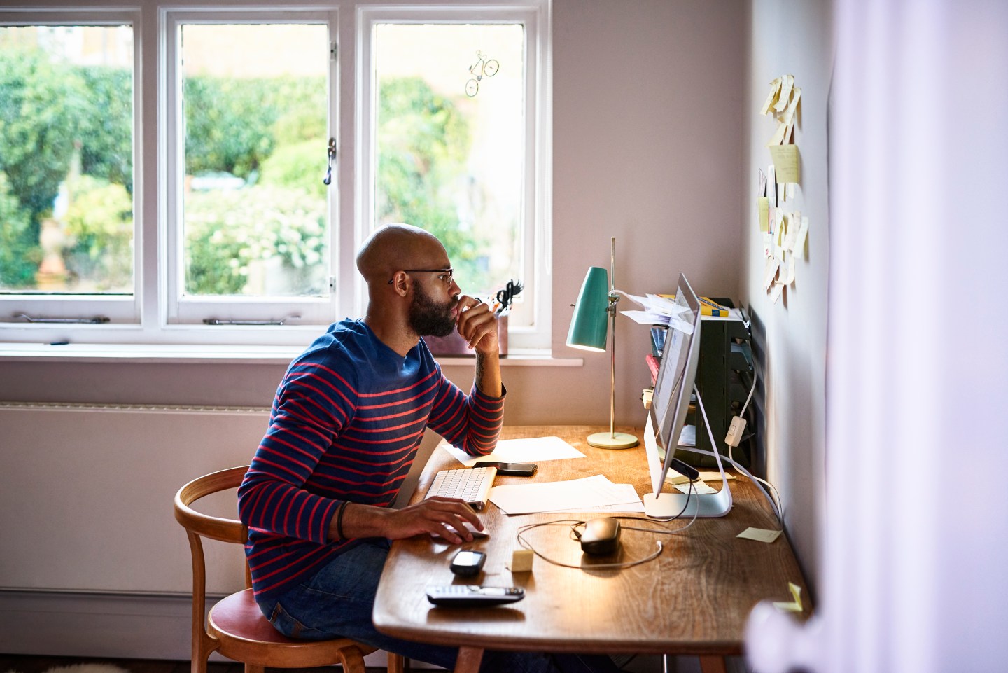 A man working in his home office.