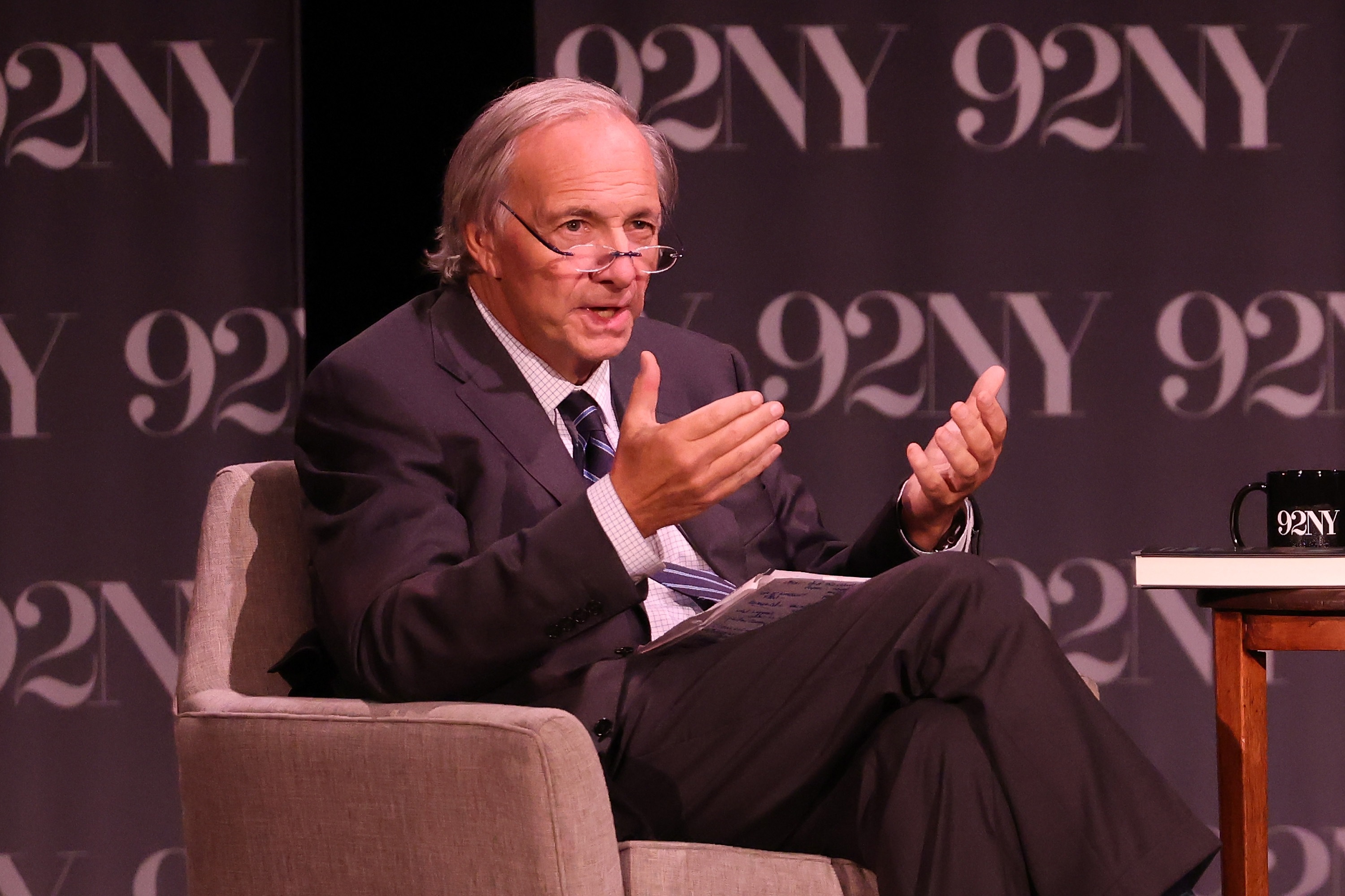 A photo of Ray Dalio speaking on stage