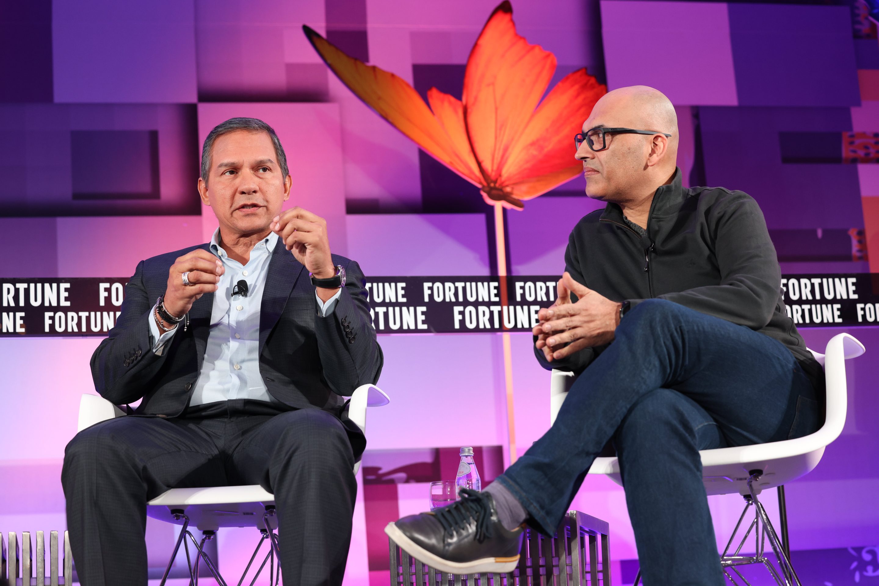 Sanjeev Vohra, global lead - Accenture Applied Intelligence (R), Accenture, and Javier Polit, chief information and digital officer, Mondelez International (L) at Fortune Brainstorm A.I. 2022.